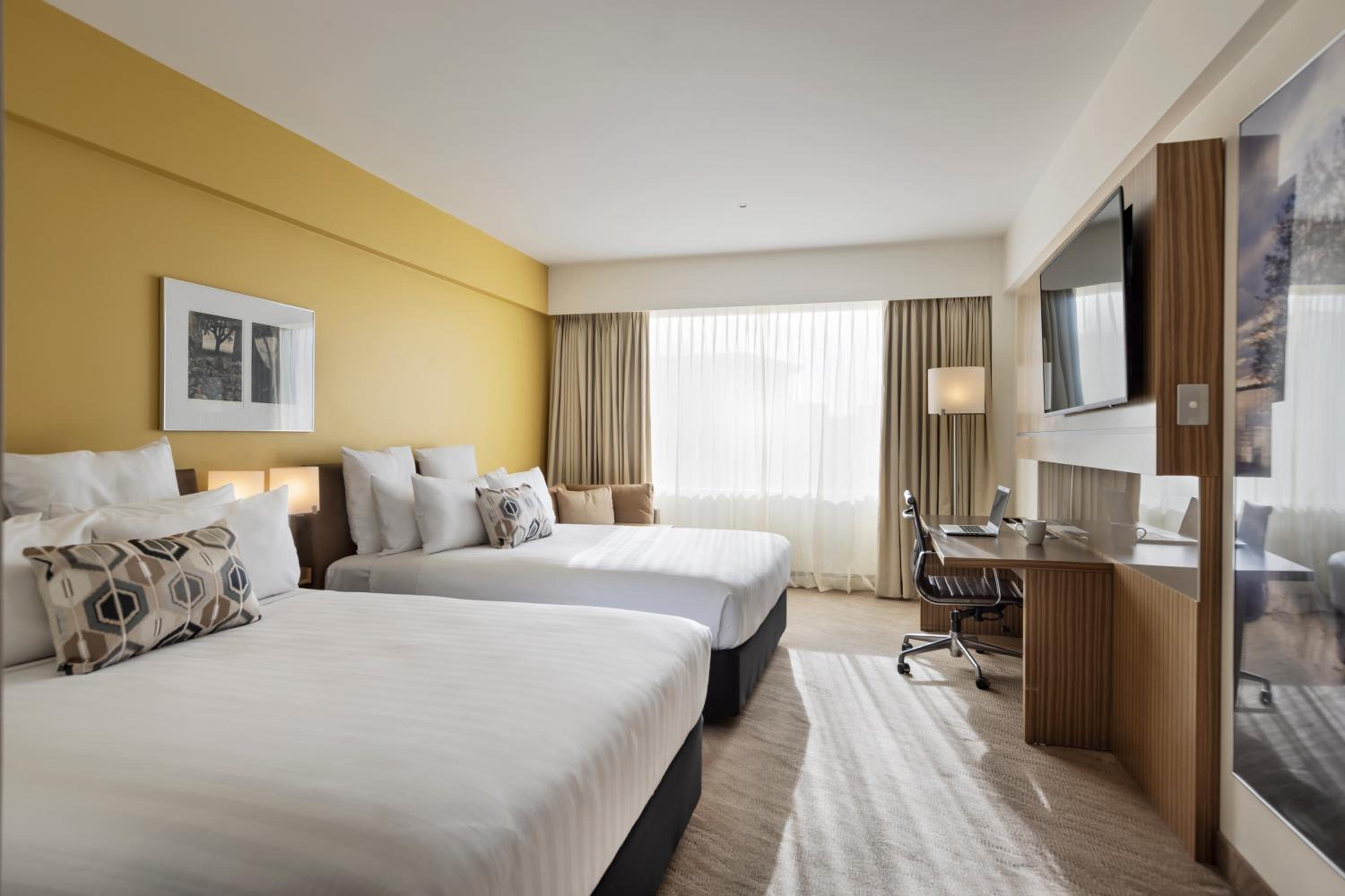 Superior Queen Room with Two Queen Beds - Photo 1