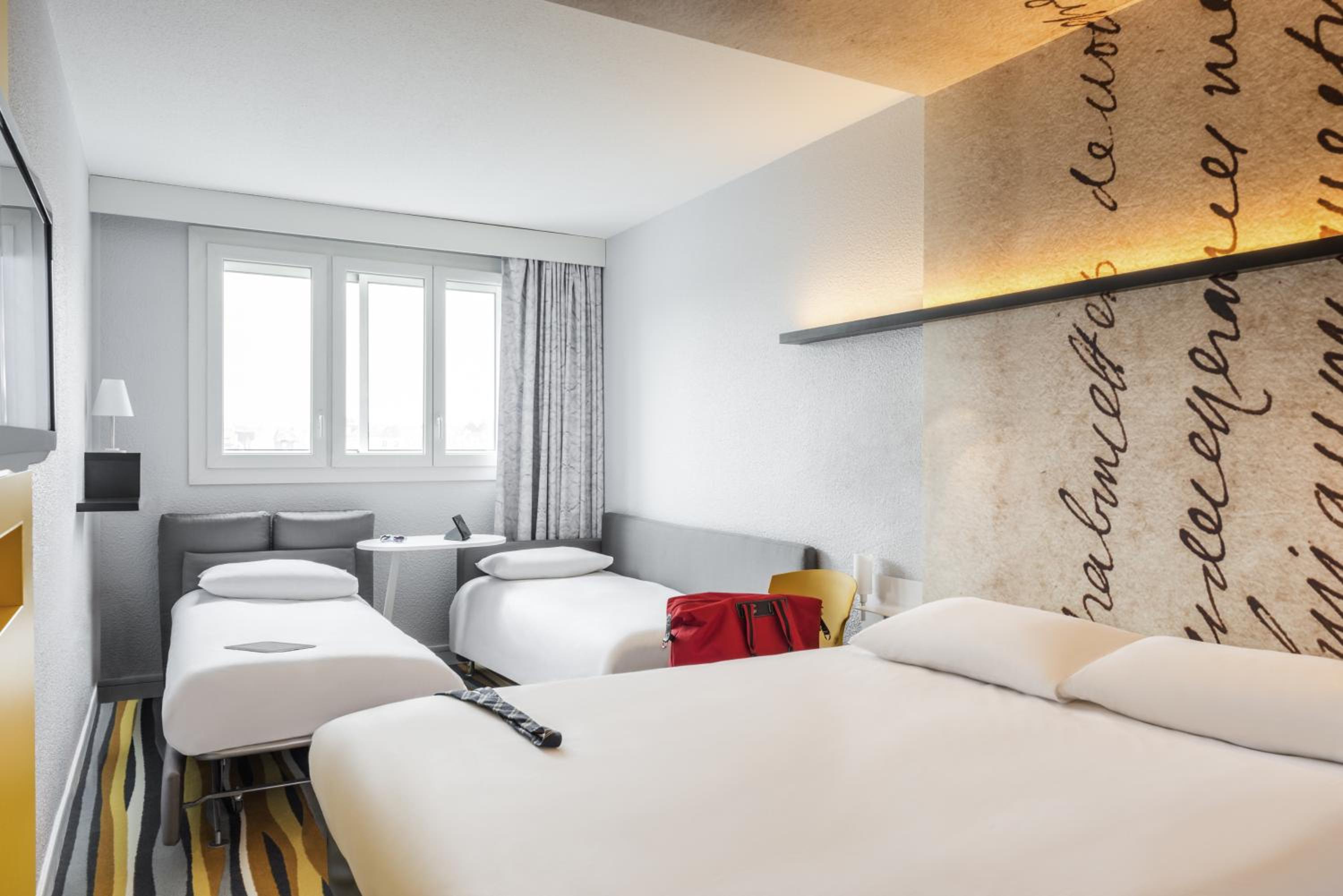 Quadruple Room with One Double Bed and Sofa Bed