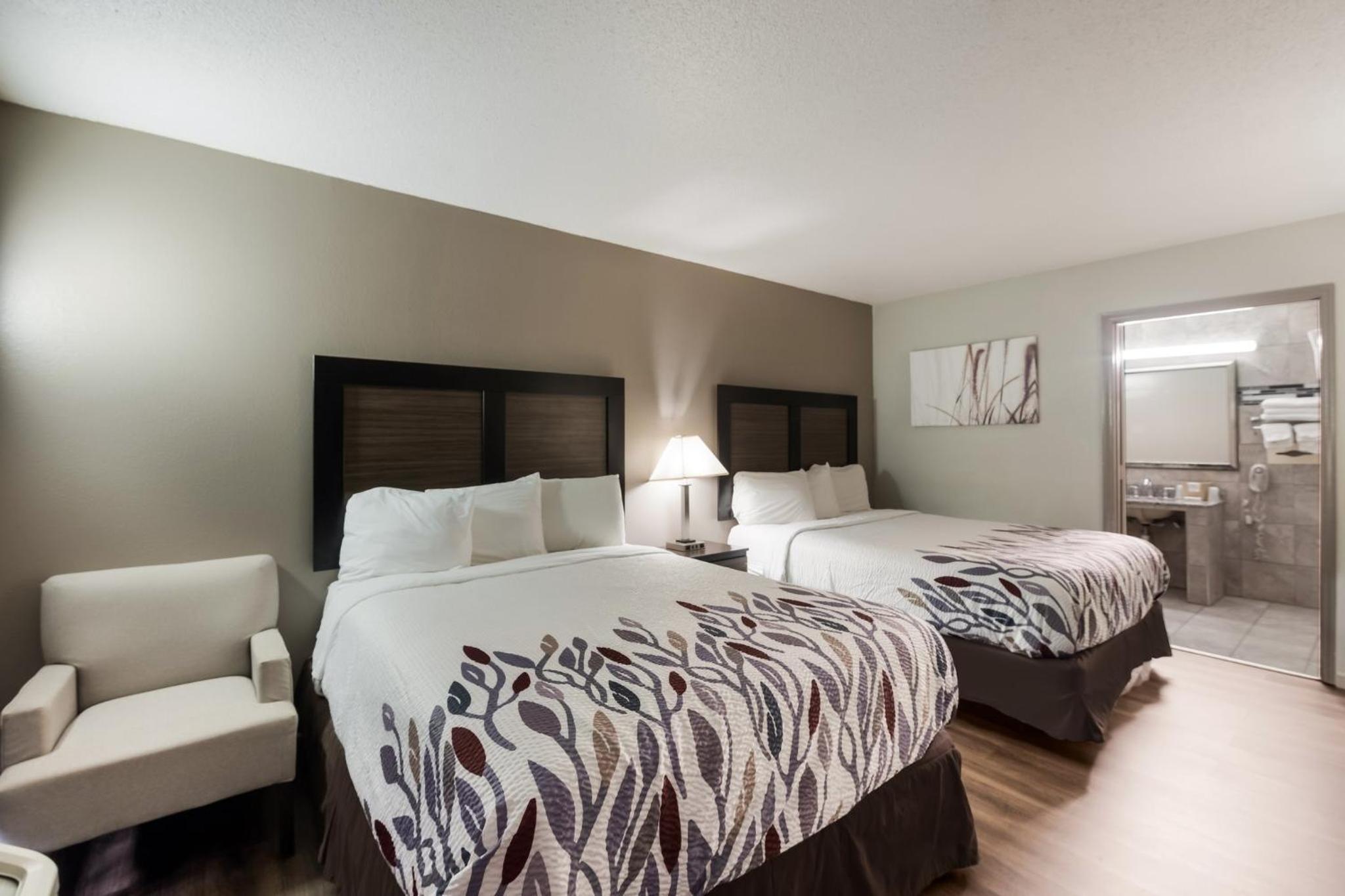 Deluxe Room with Two Queen Beds Disability Access Non-Smoking - Photo 1