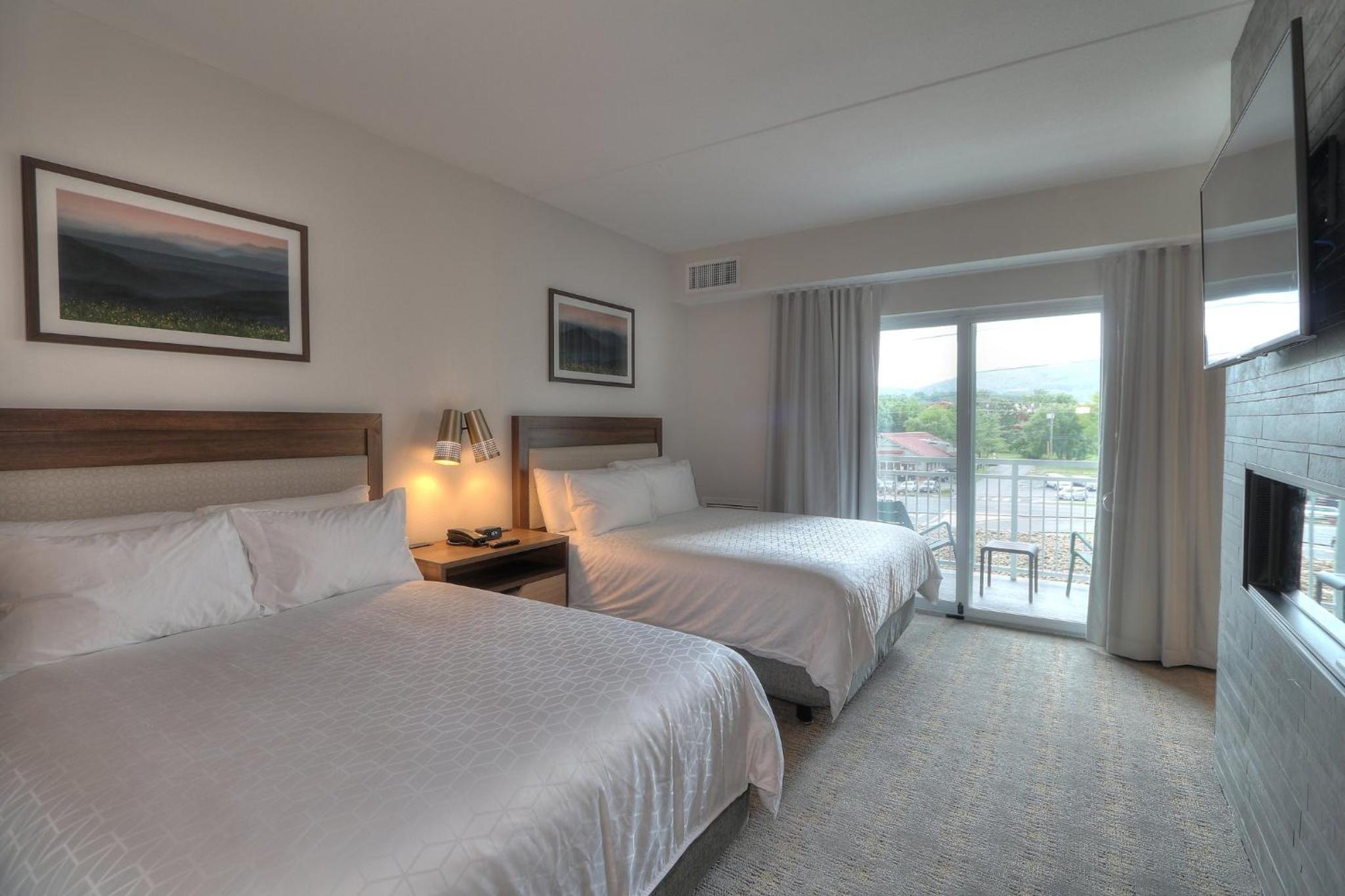 Queen Suite with Two Queen Beds Fireplace and Parkway Balcony - Photo 6