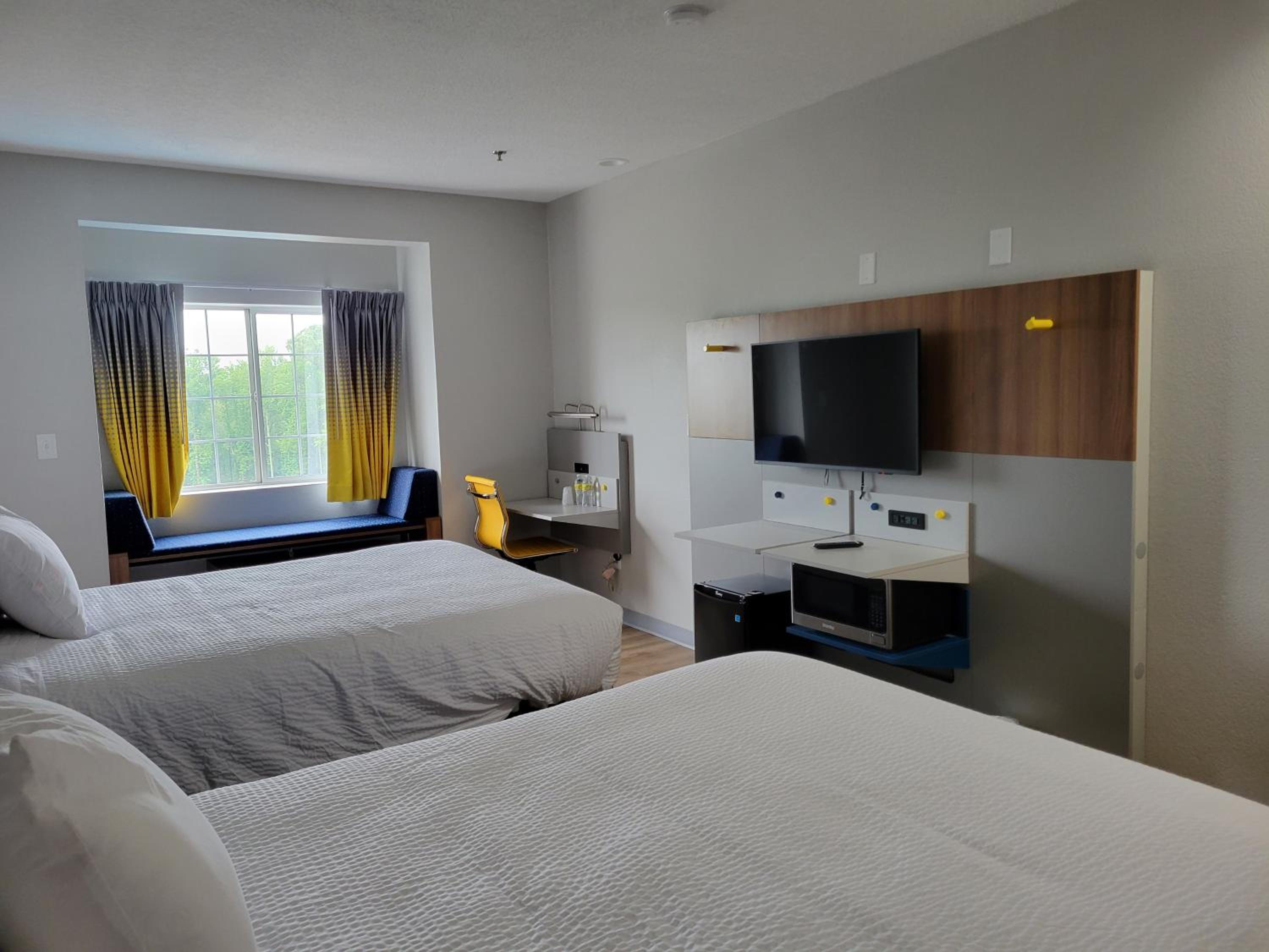 Deluxe Queen Room with Two Queen Beds- Non-Smoking - Photo 1