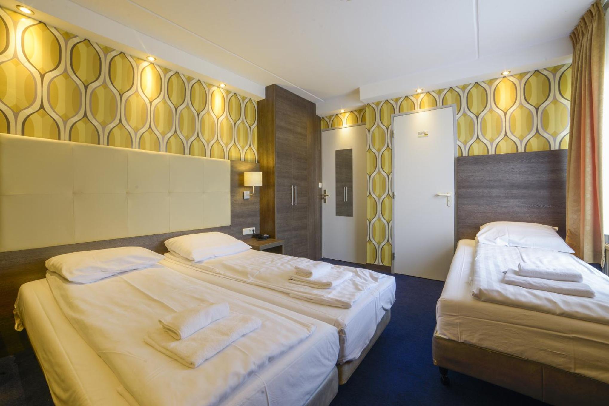 Triple Room - Photo 1