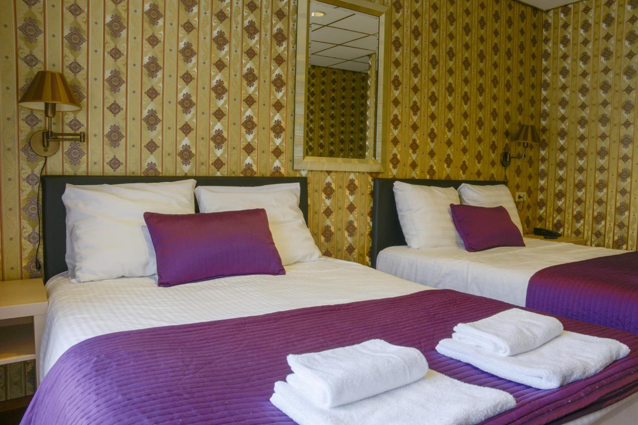 Quadruple Room - Photo 1