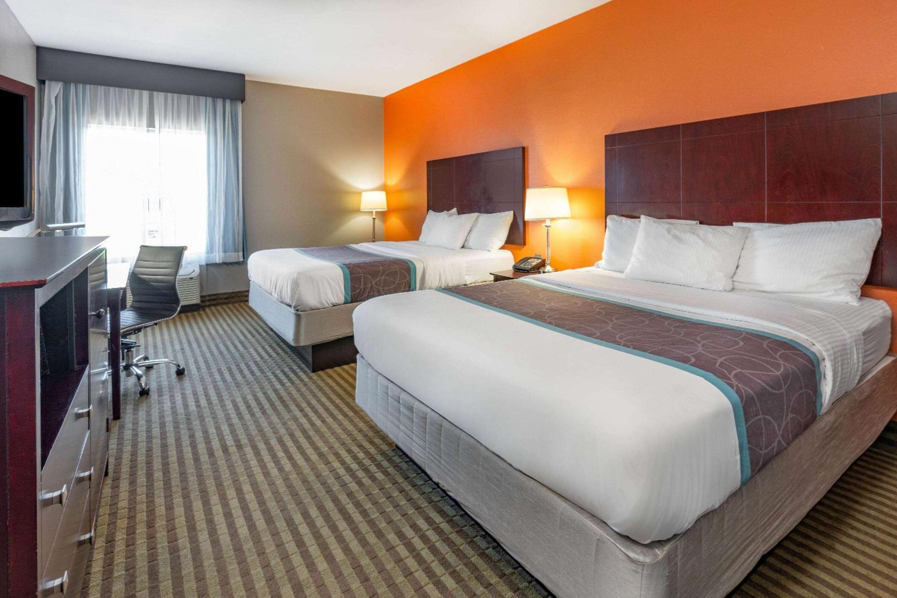 Deluxe Queen Room with Two Queen Beds - Photo 1