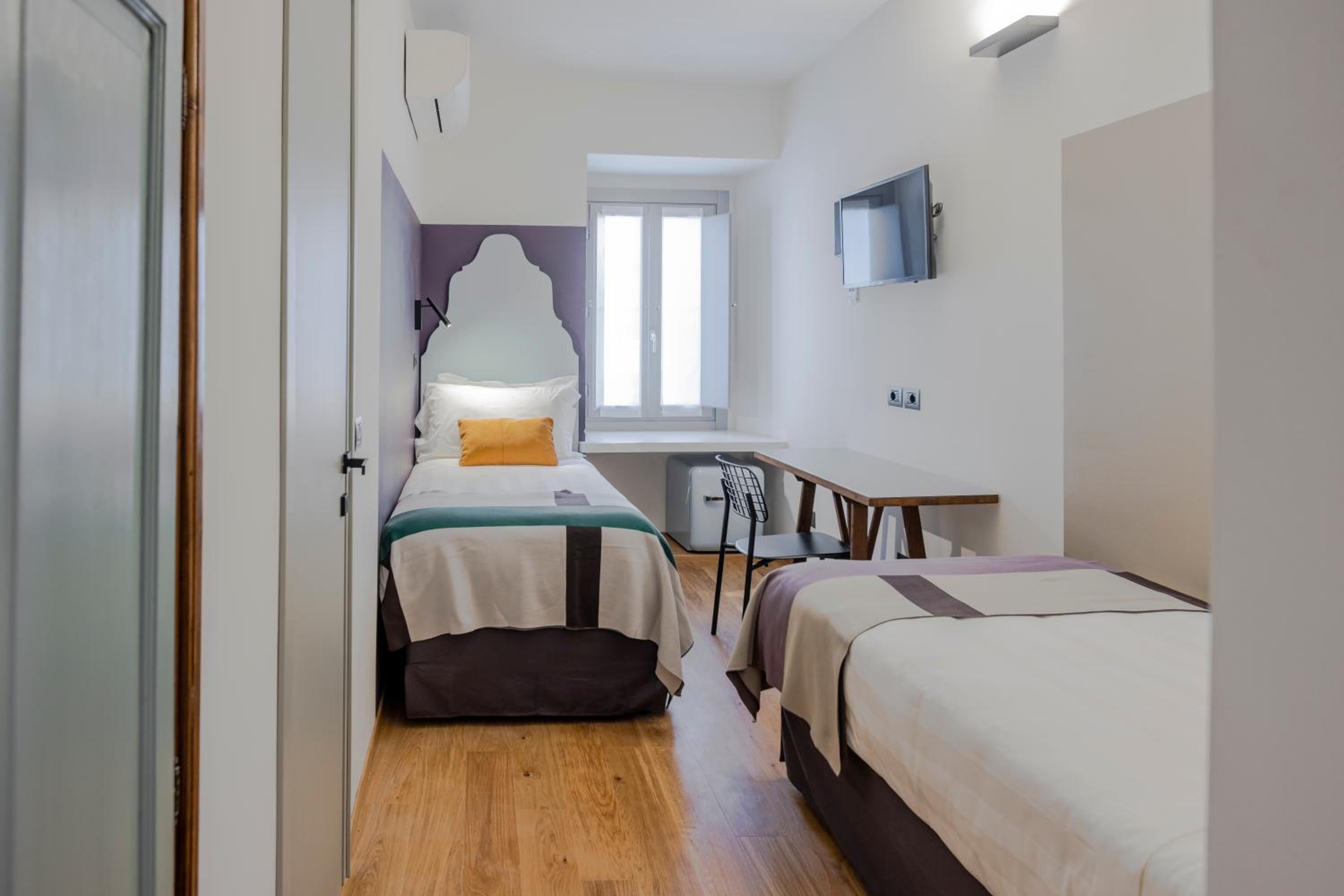 Twin Room - Photo 1