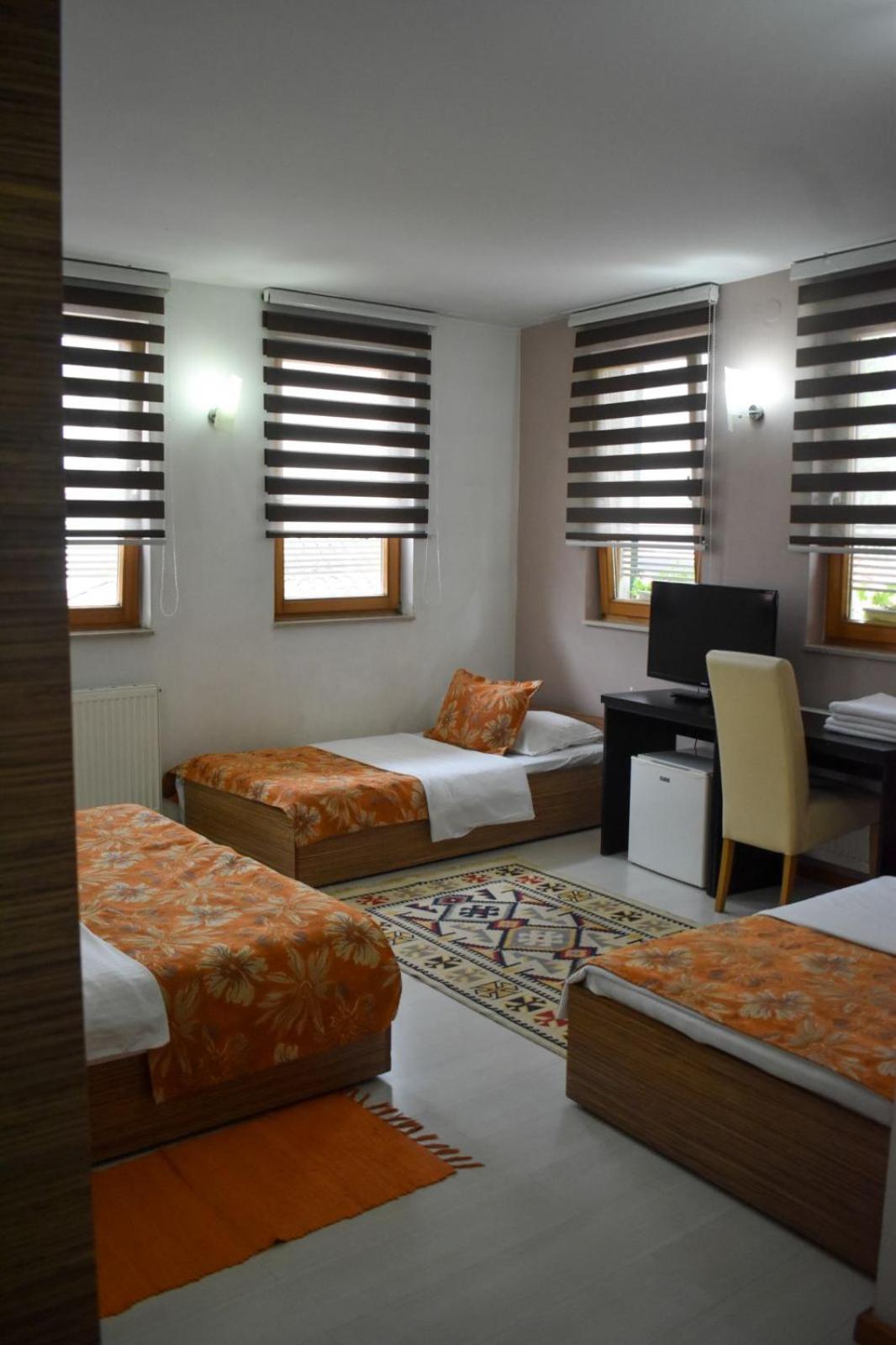 Quadruple Room - Photo 1