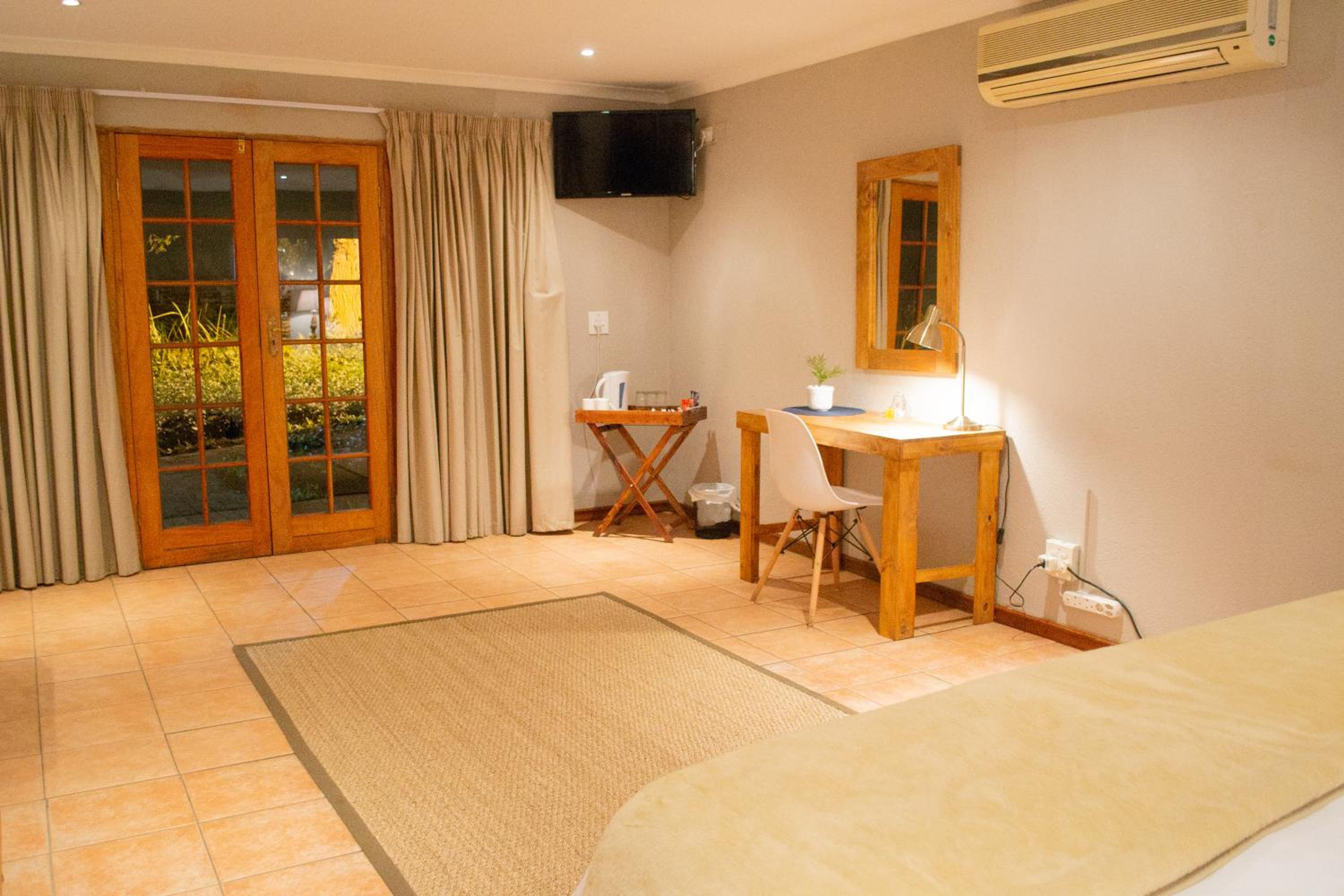 Triple Room with Garden View photo 2
