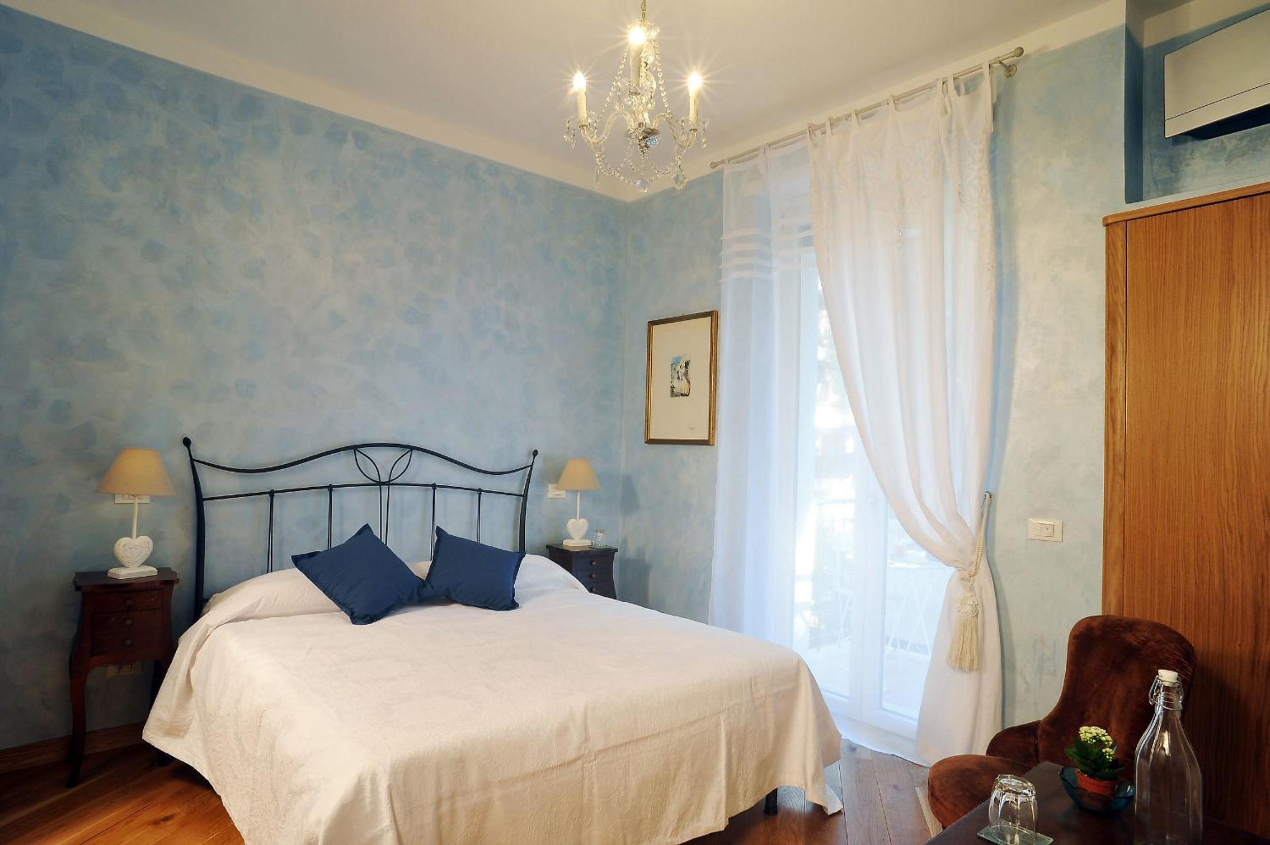 Double or Twin Room with Balcony and Garden View