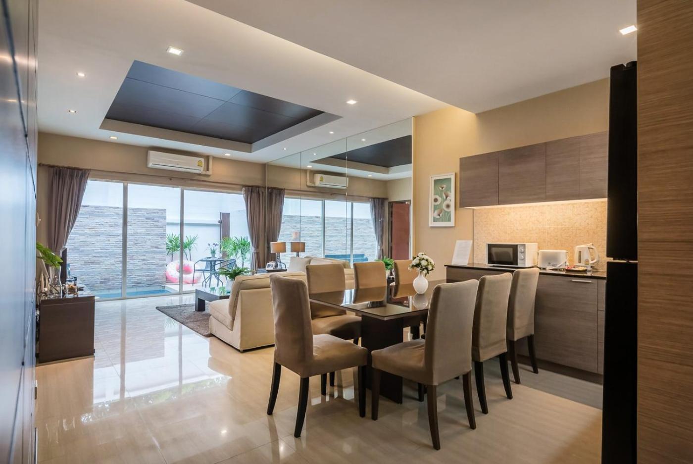 Three-Bedroom House - Photo 25