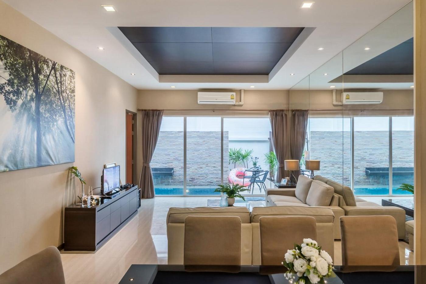 Three-Bedroom House - Photo 23