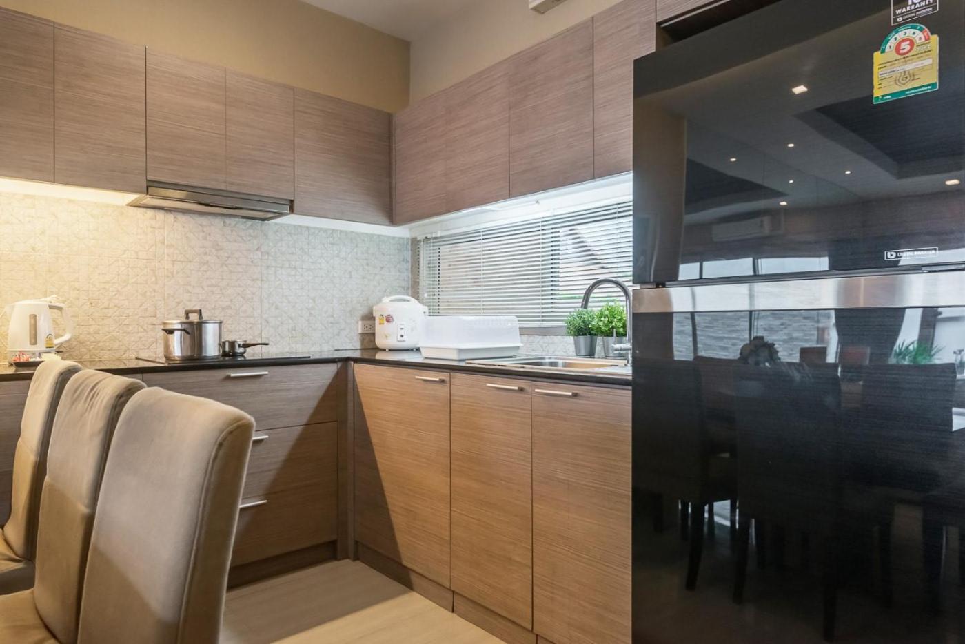 Three-Bedroom House - Photo 19