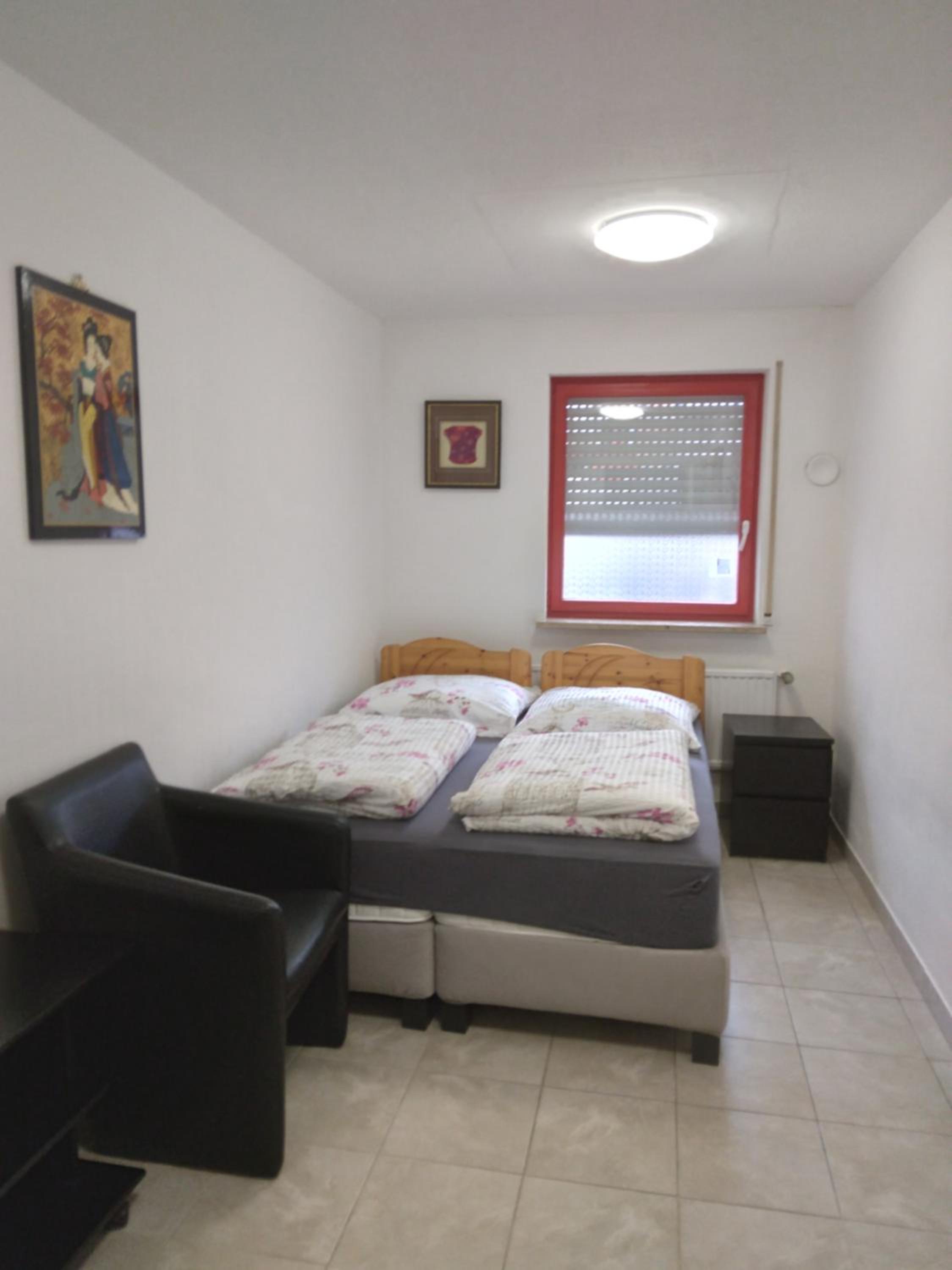 Three-Bedroom Apartment photo 1