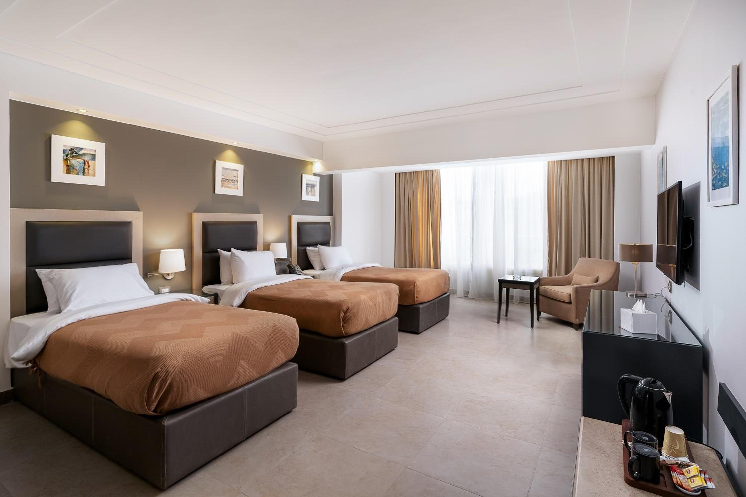 Deluxe Triple Room - Photo 1