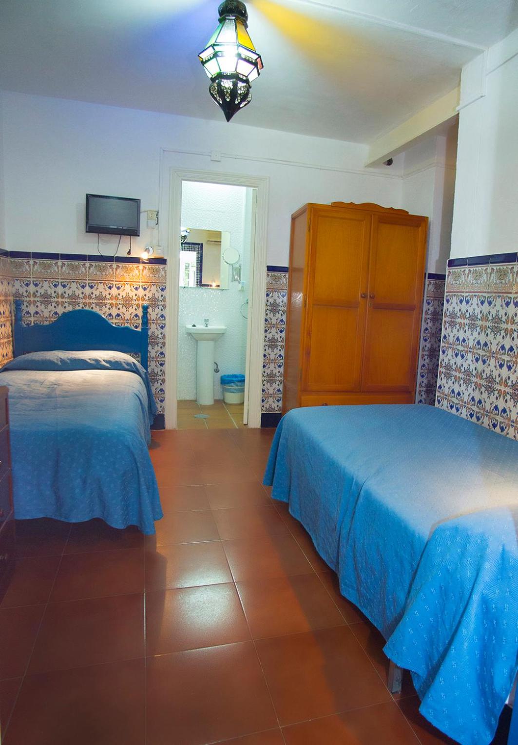 Habitación Triple con Baño Privado