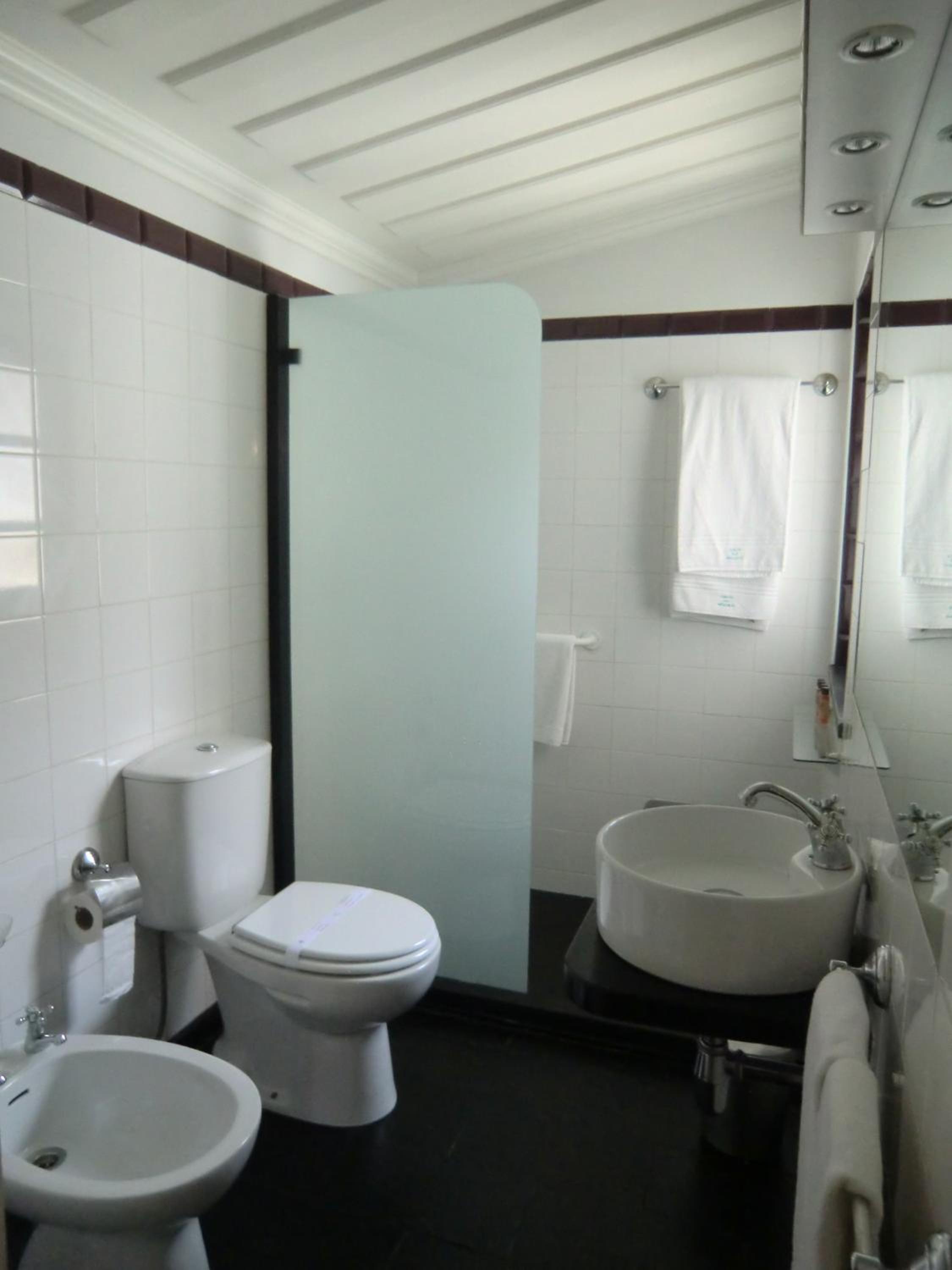 Three-Bedroom House - Photo 15