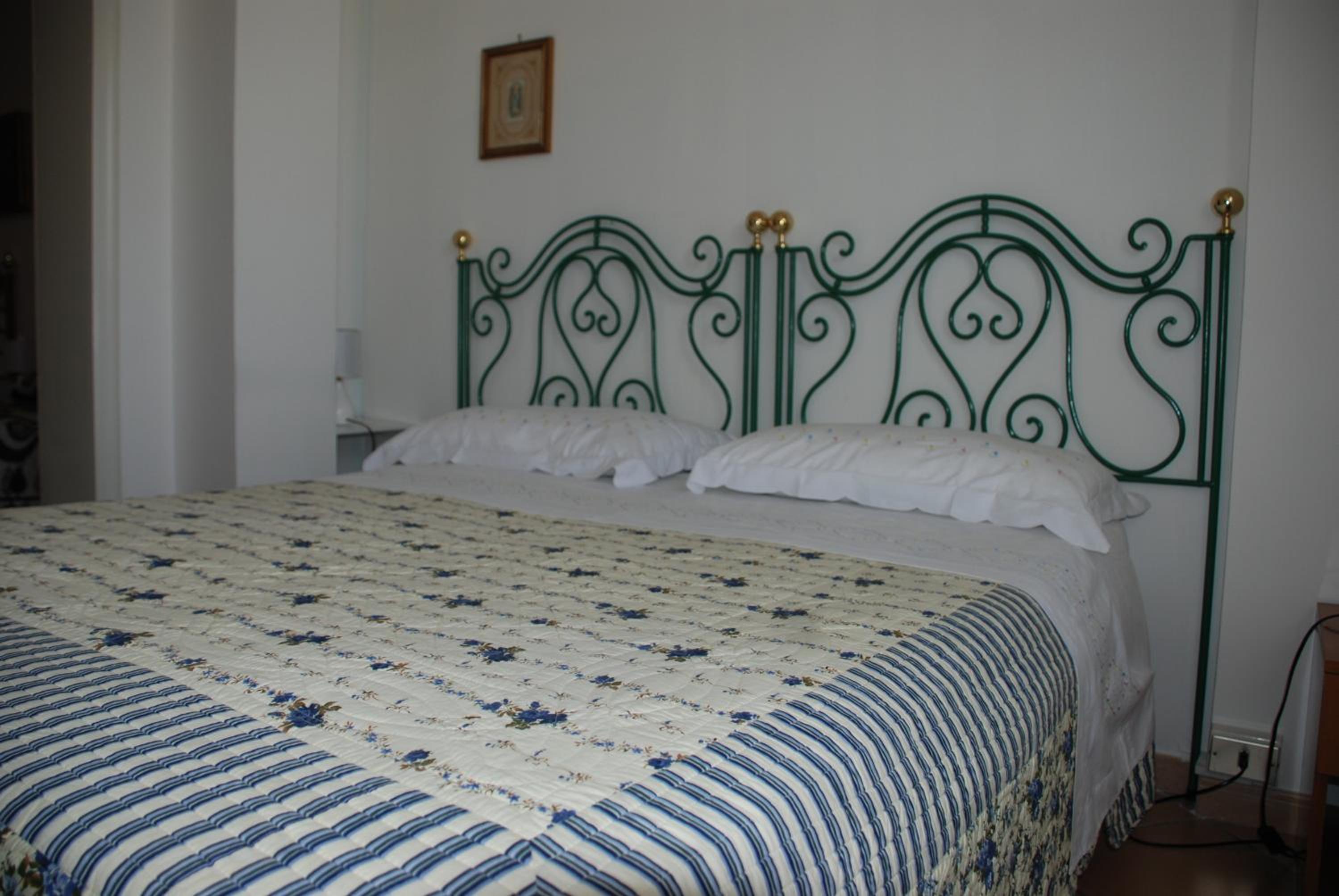 Quadruple Room with Private Bathroom