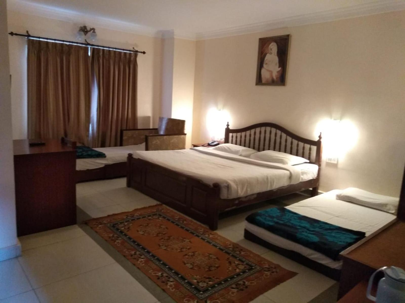 Deluxe Room - Photo 2