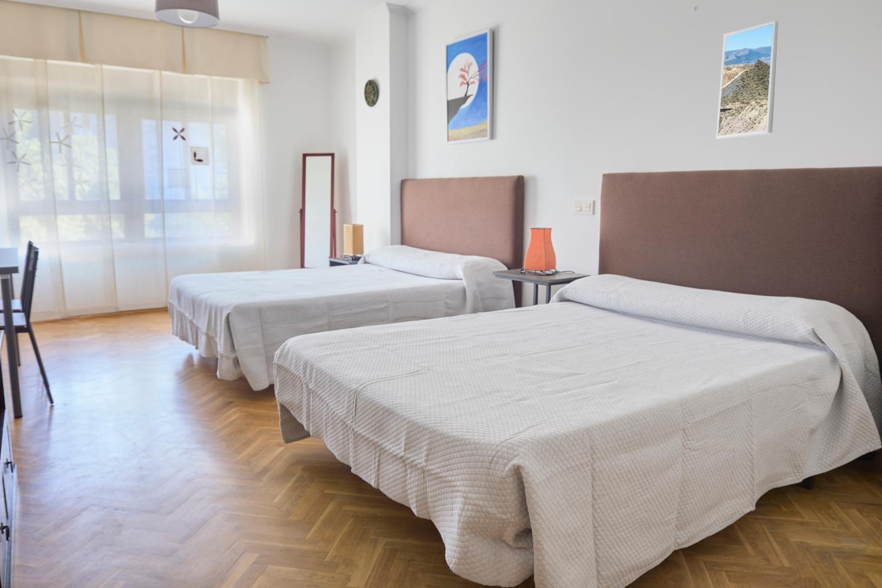 Habitación Queen con Dos Camas Queen