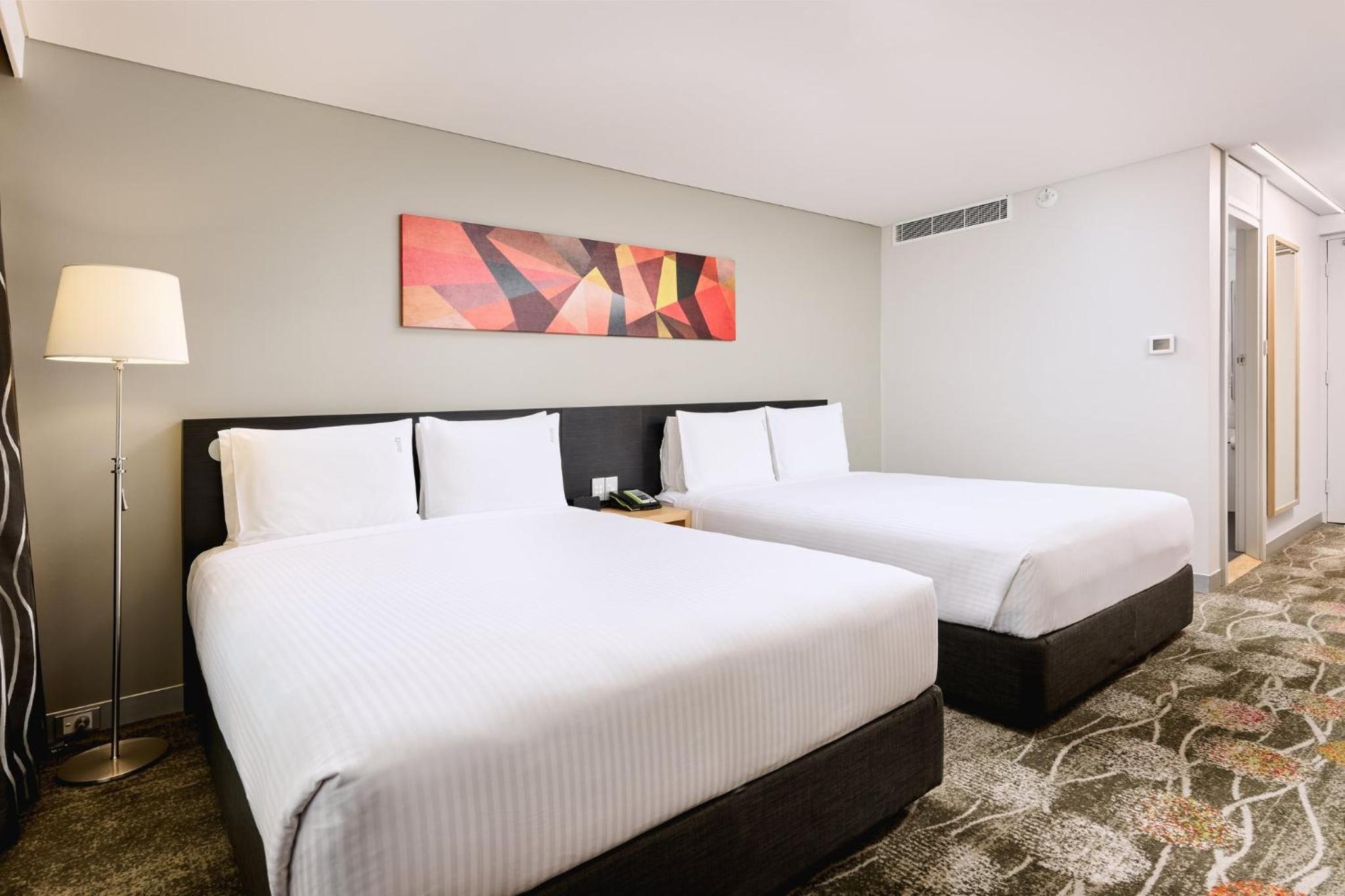 Standard Queen Room with Two Queen Beds - Photo 2