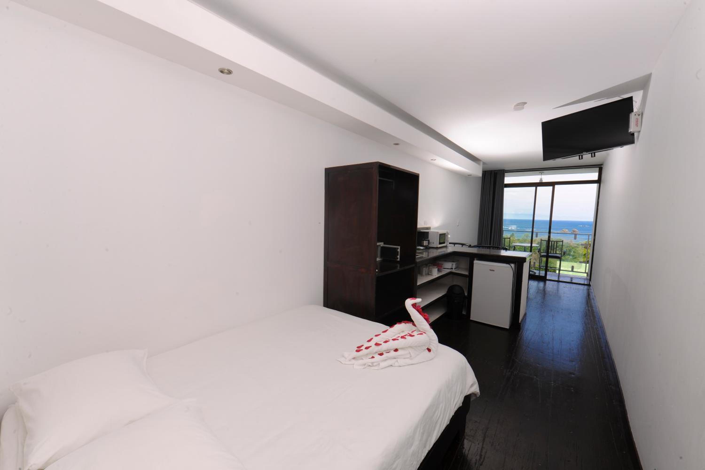 Quarto Triplo com Vista para o Mar