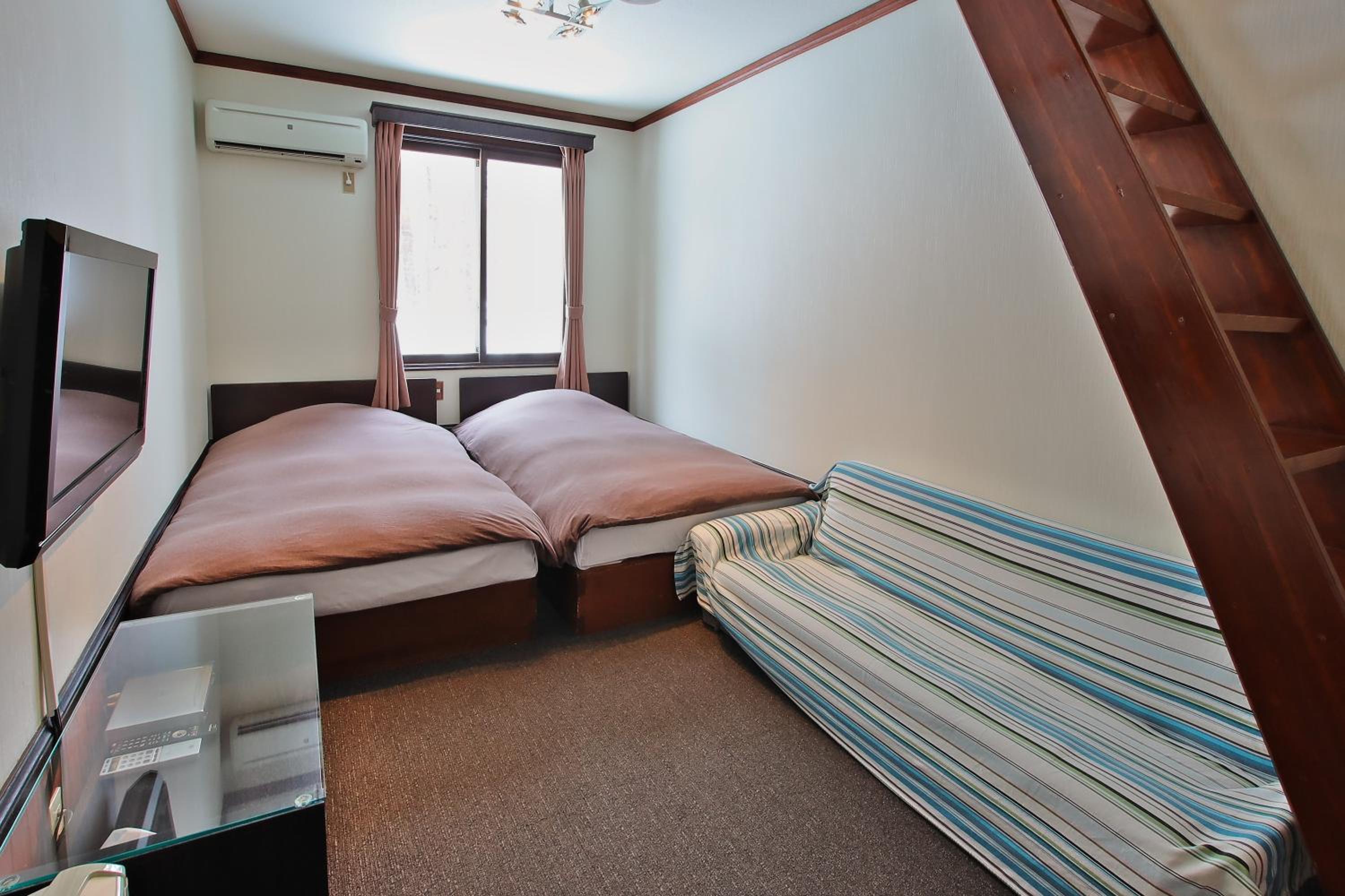 Quadruple Room with Shared Bathroom