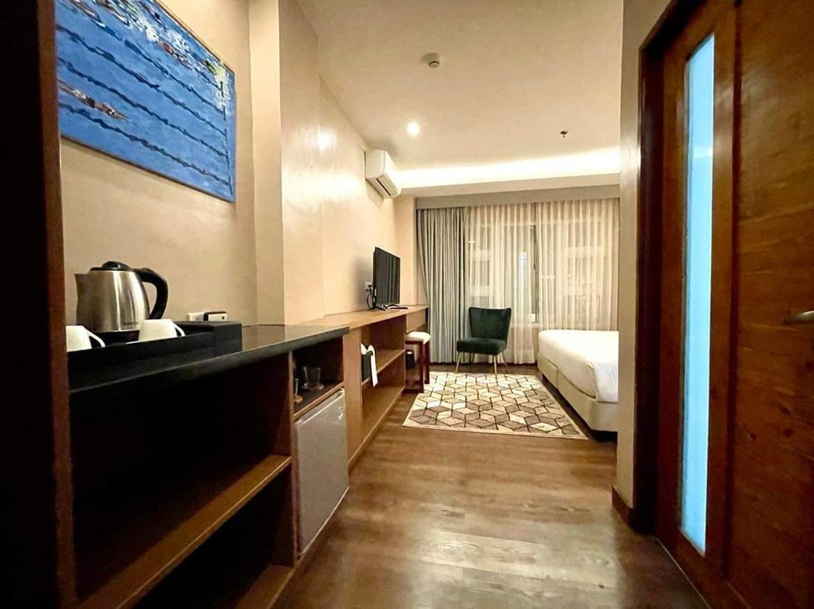 Deluxe Quadruple Room - Photo 1