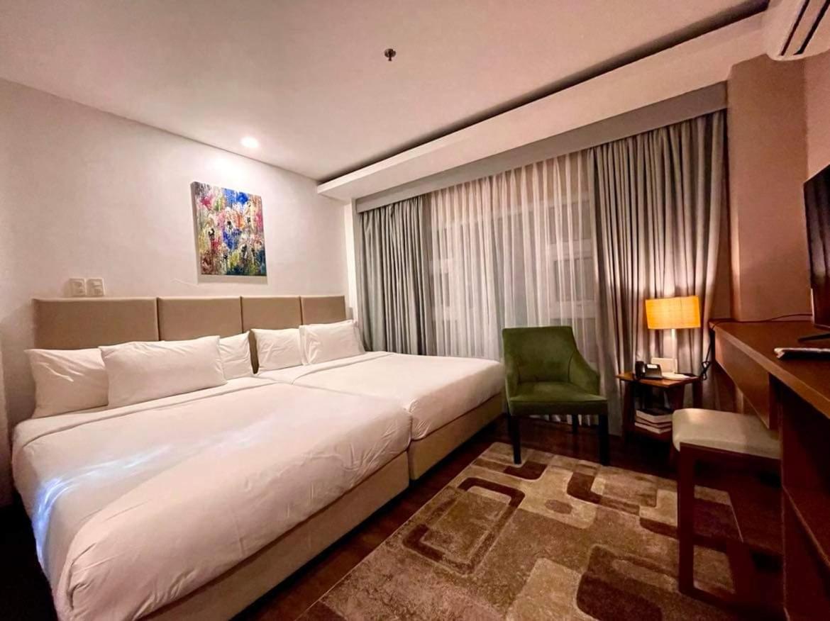 Deluxe Quadruple Room - Photo 9