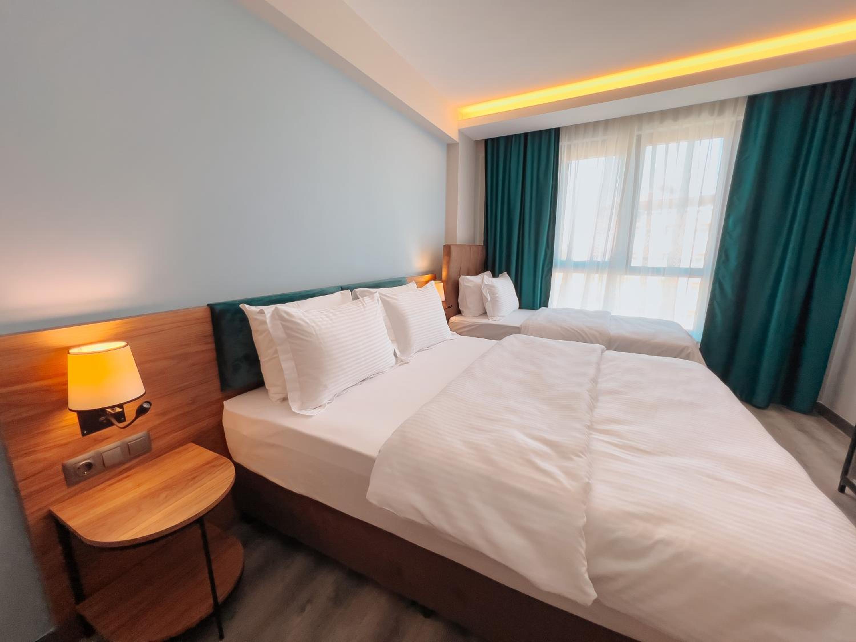 Deluxe Triple Room