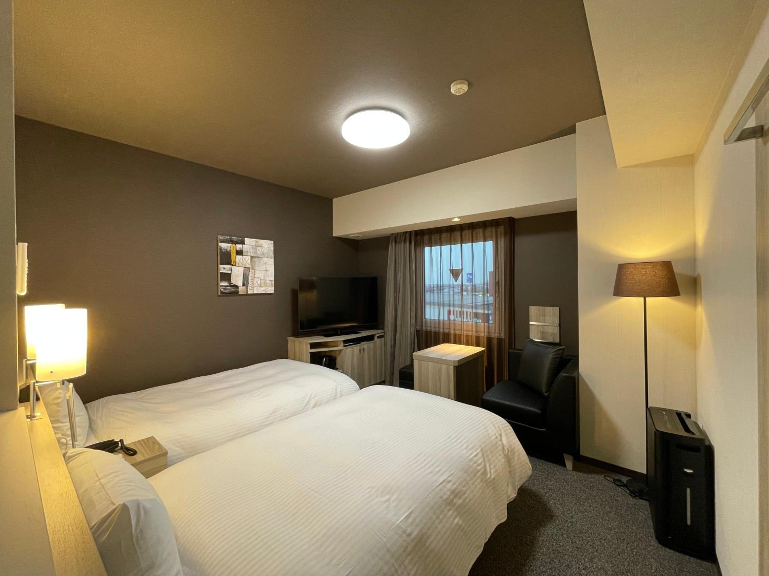 Twin Room - Non-Smoking - Photo 1