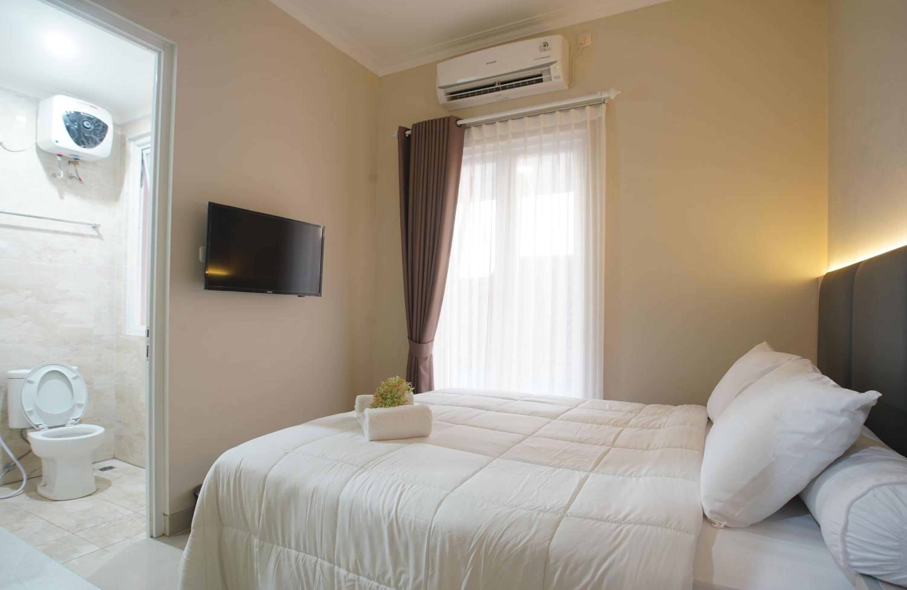 Four-Bedroom House - Photo 17