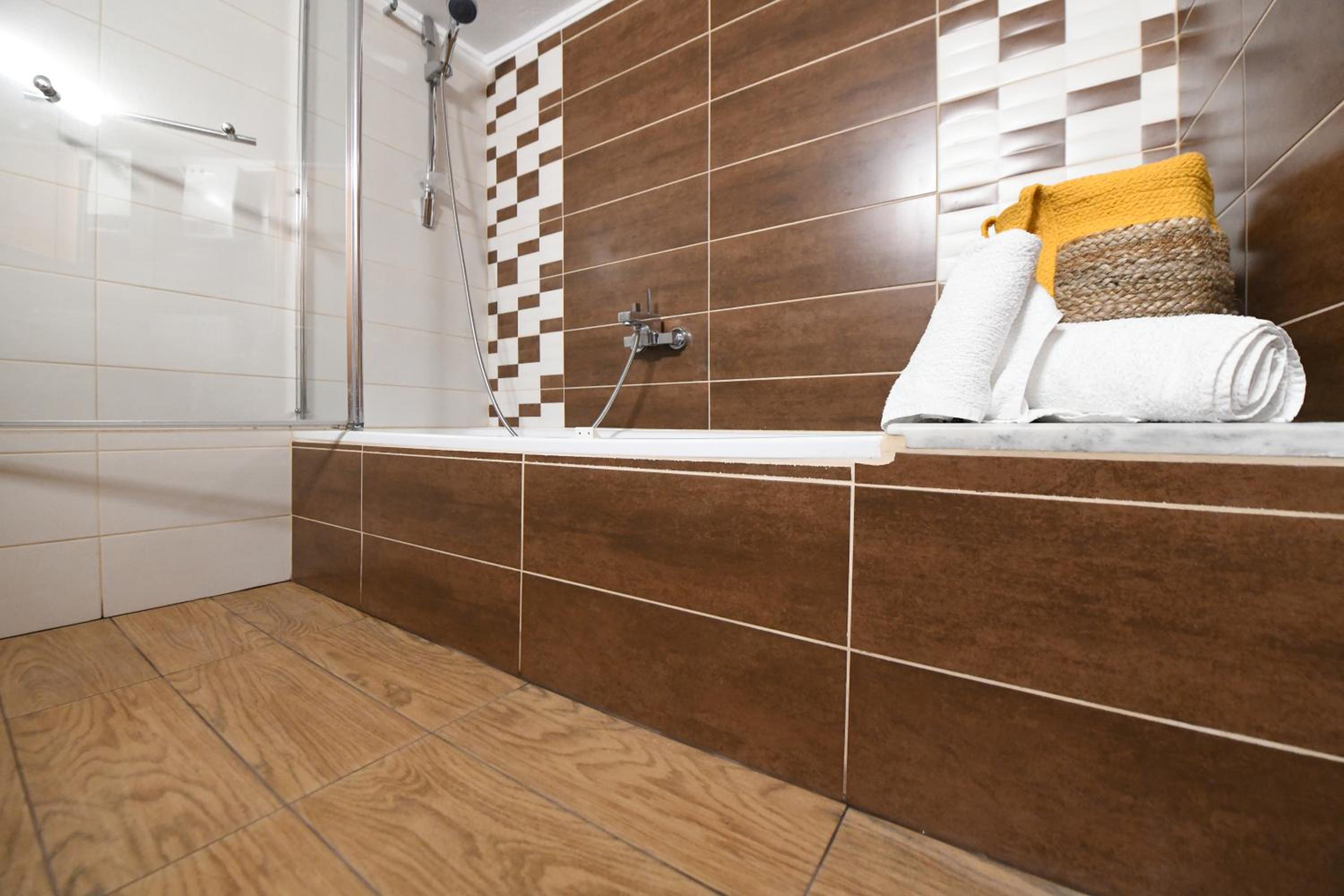 Three-Bedroom Apartment - Photo 12