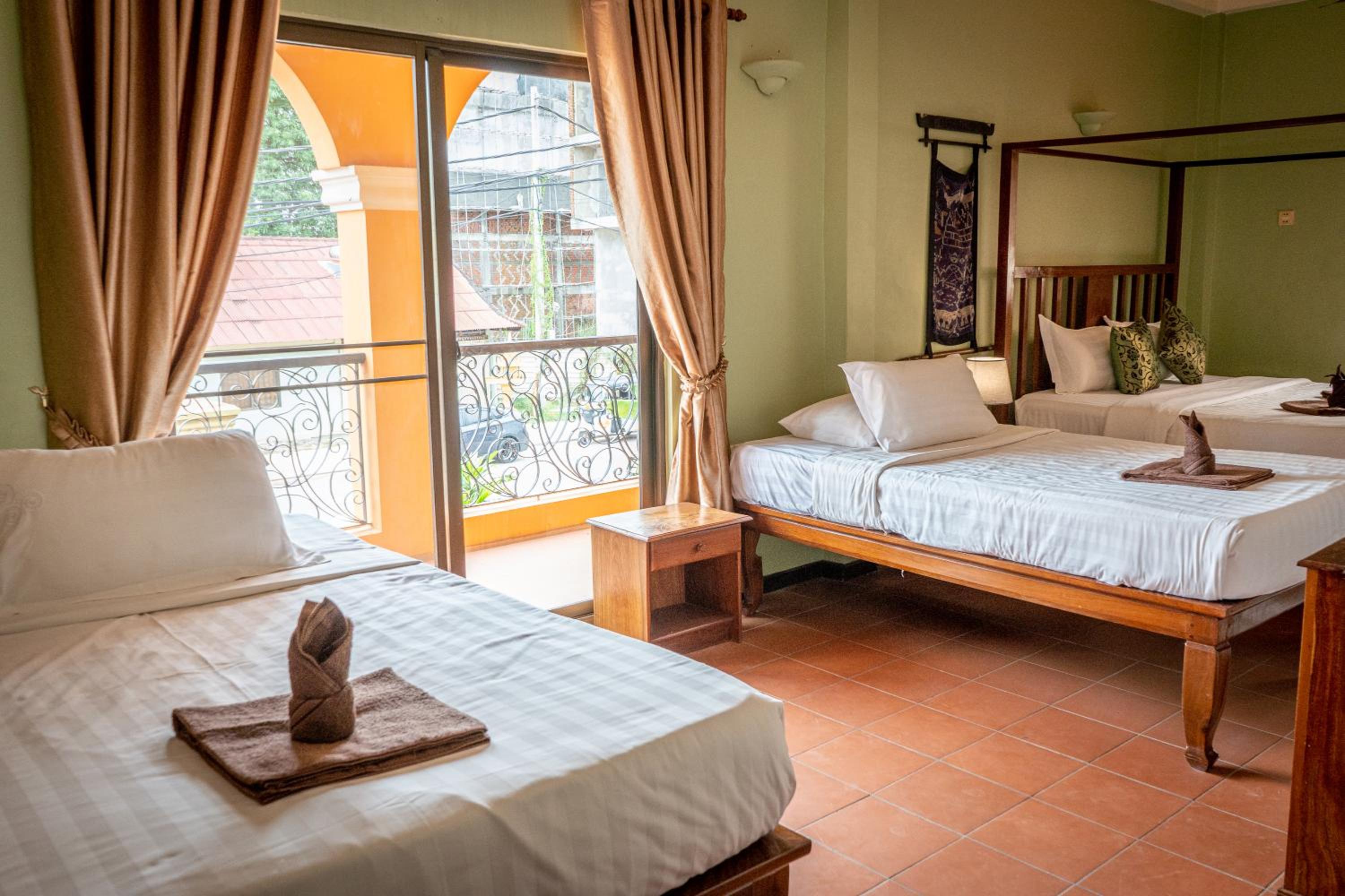 Triple Room with Balcony - Photo 1