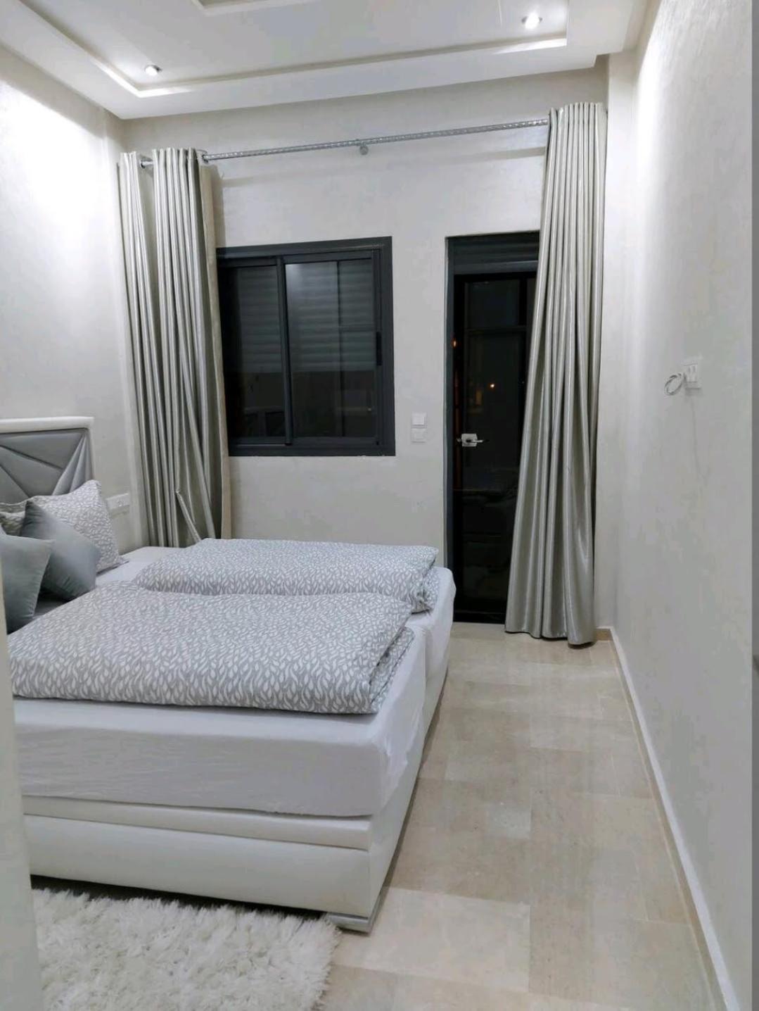 Two-Bedroom Apartment - Photo 24