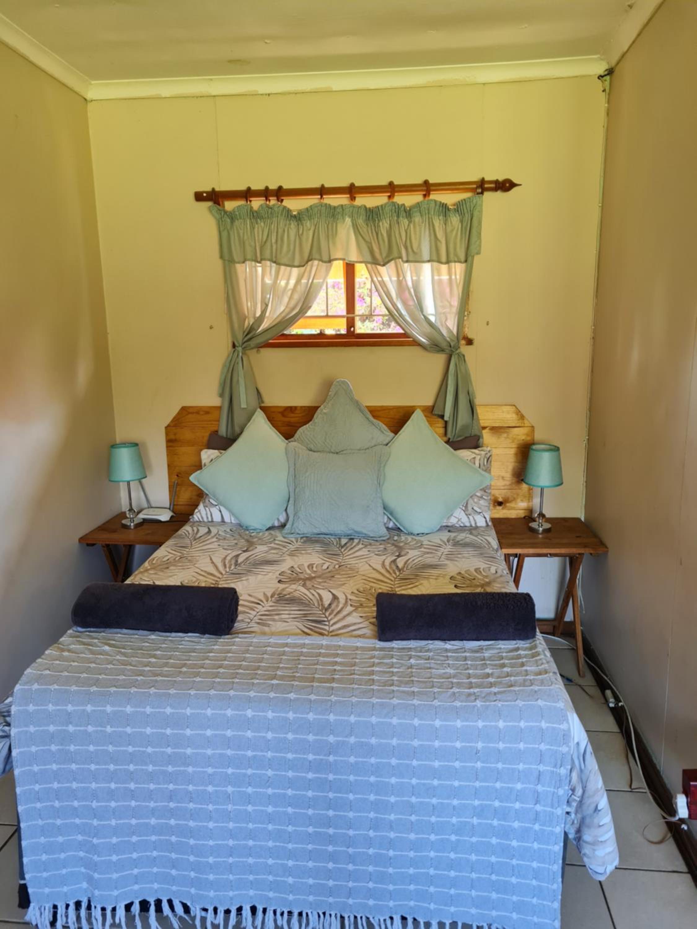 Three-Bedroom House - Photo 23