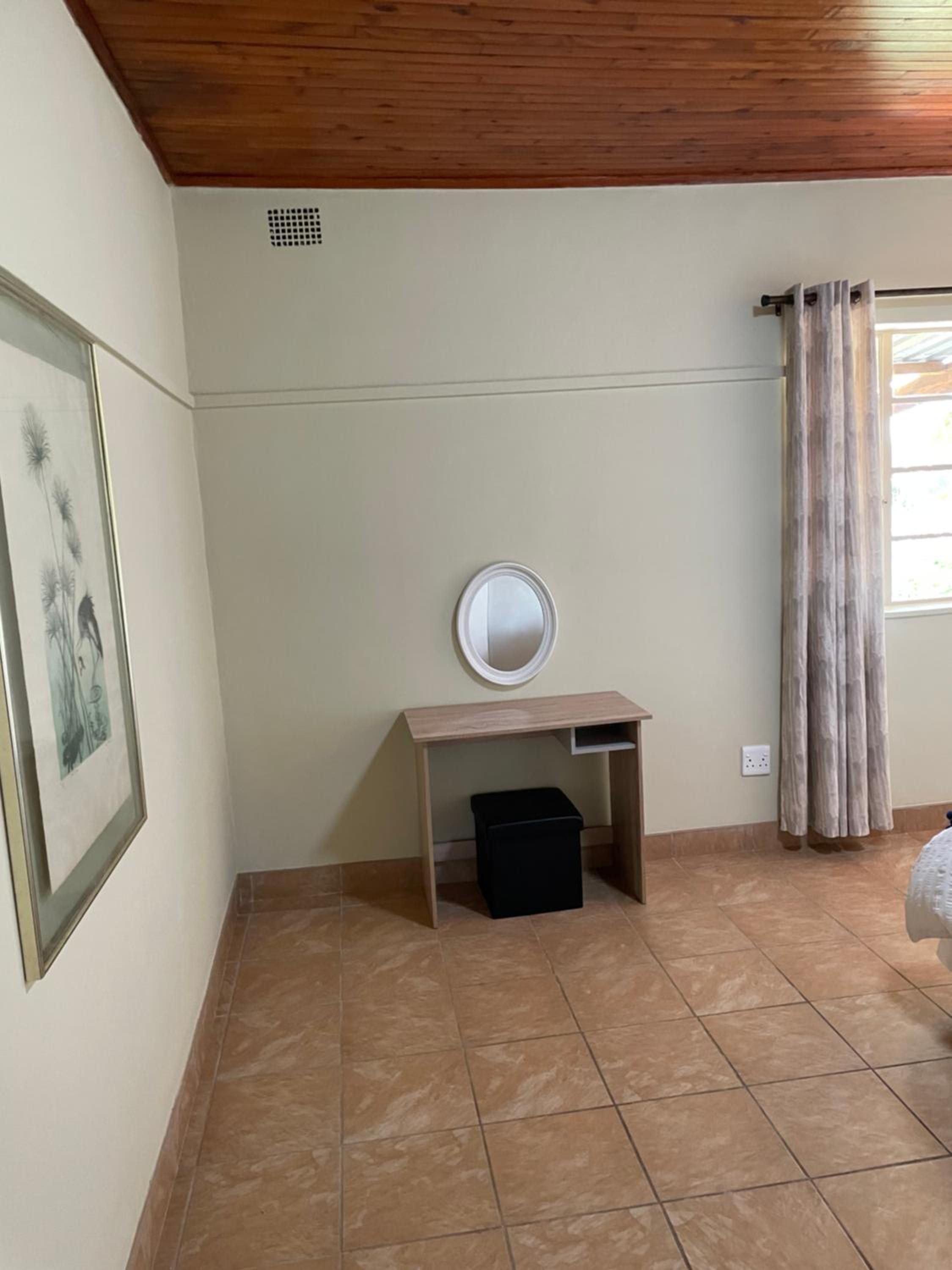 Four-Bedroom House - Photo 32