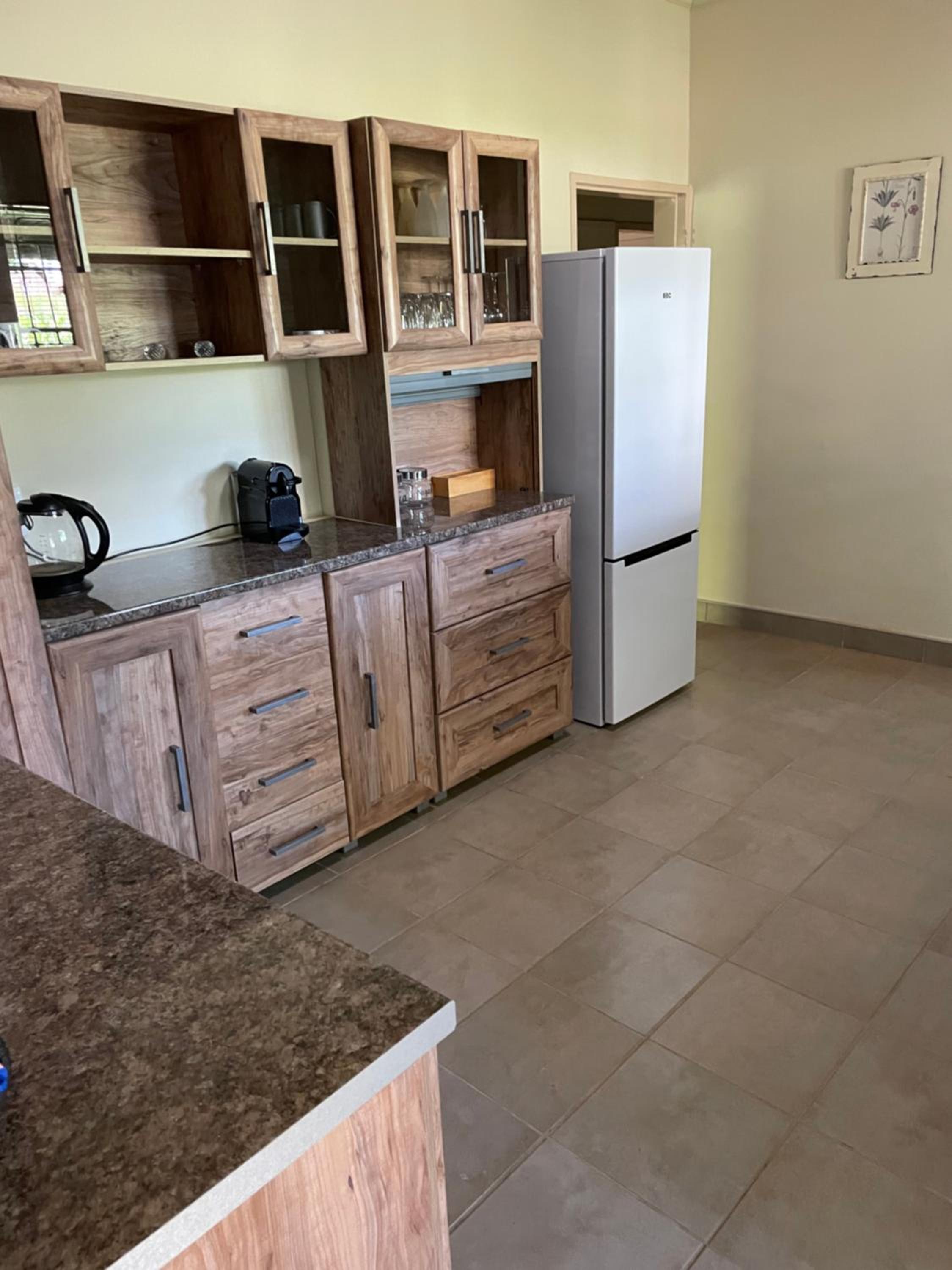 Four-Bedroom House - Photo 31