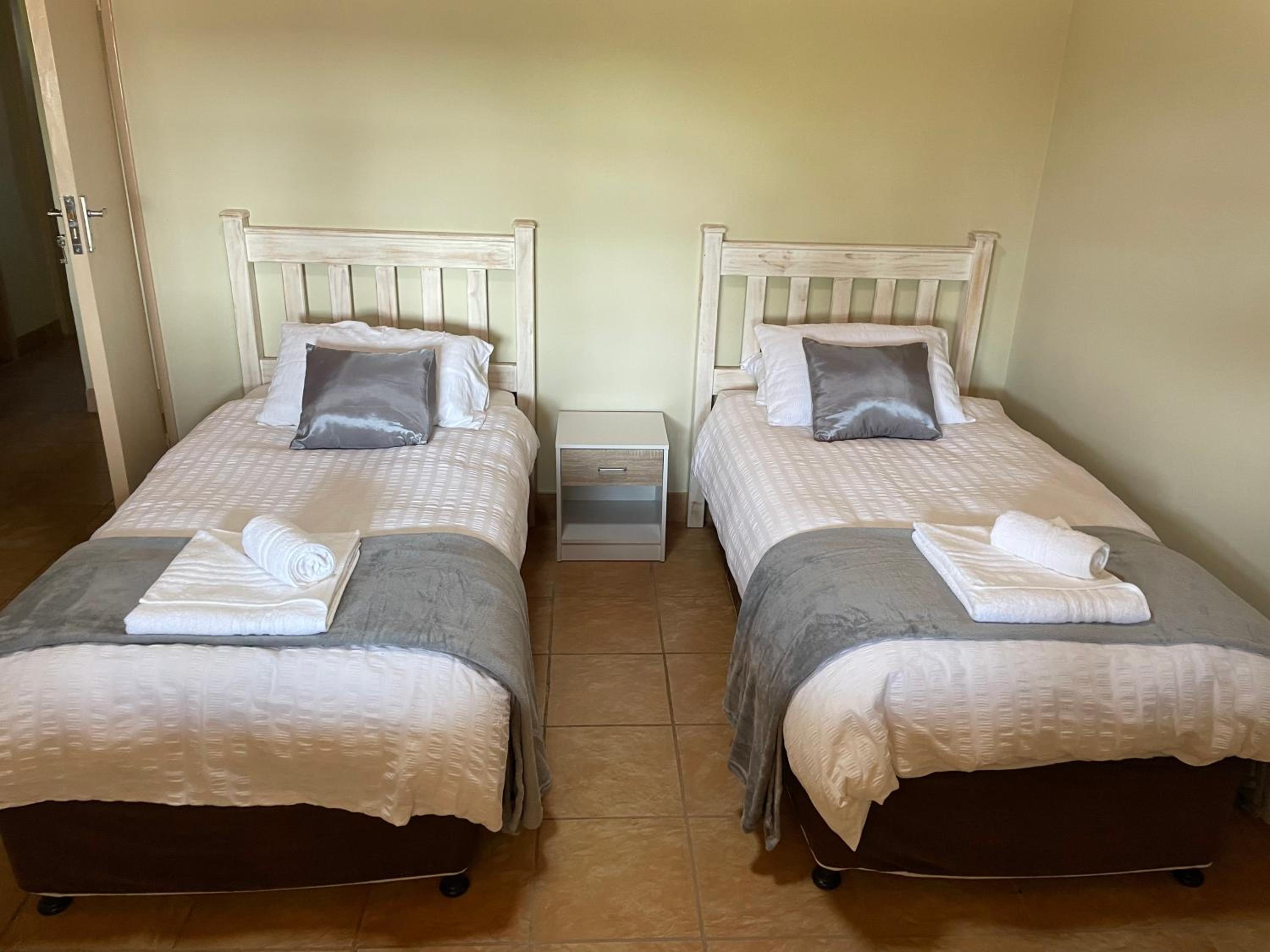 Four-Bedroom House - Photo 26