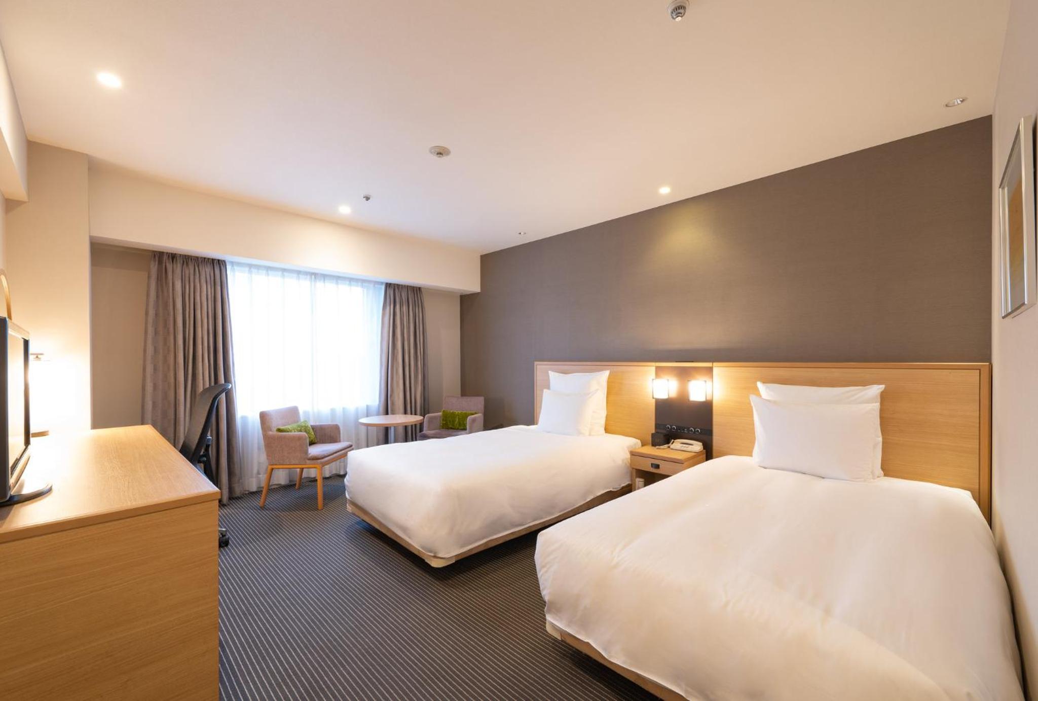 Premium Twin Room - Photo 7
