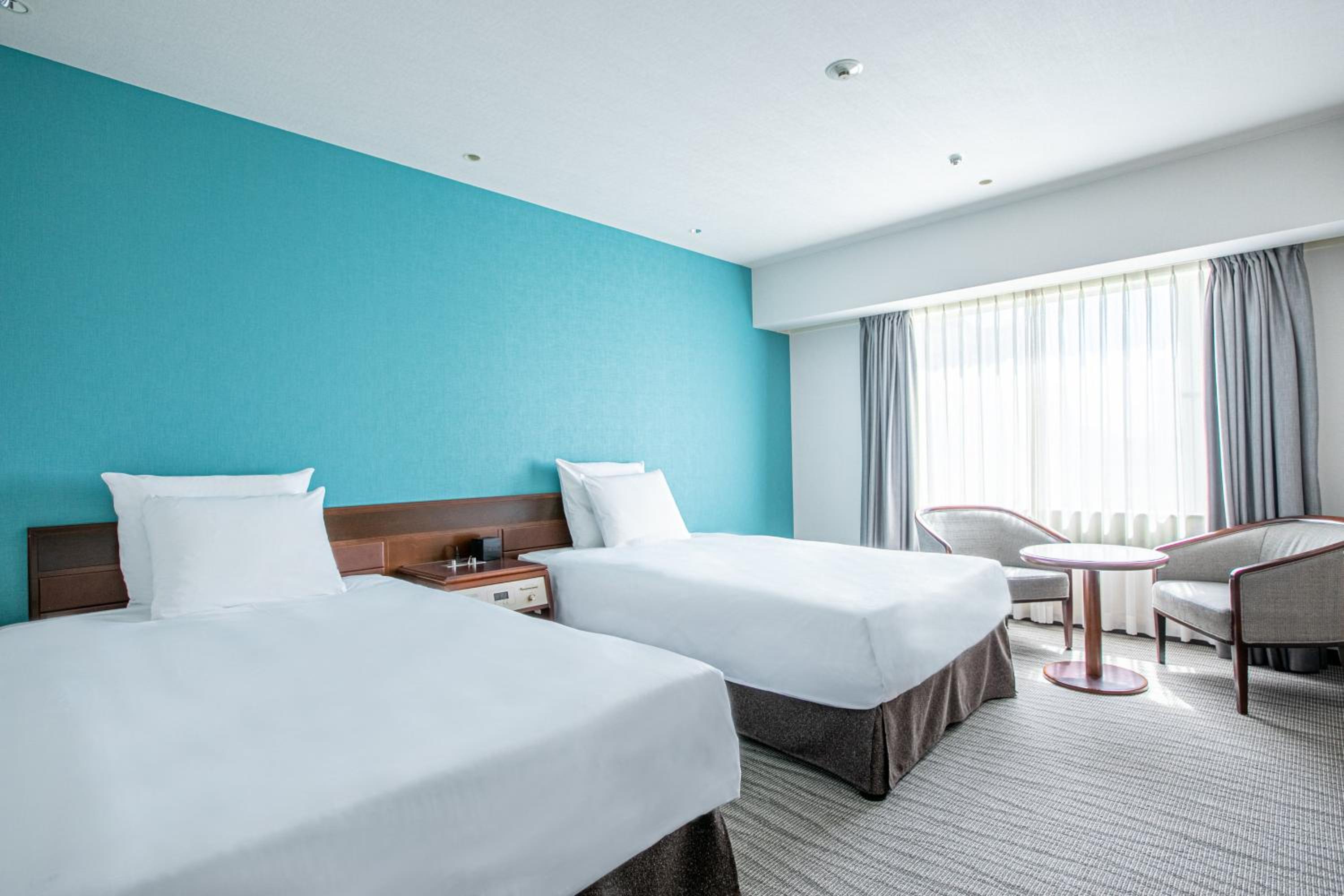 Premium Twin Room - Photo 3