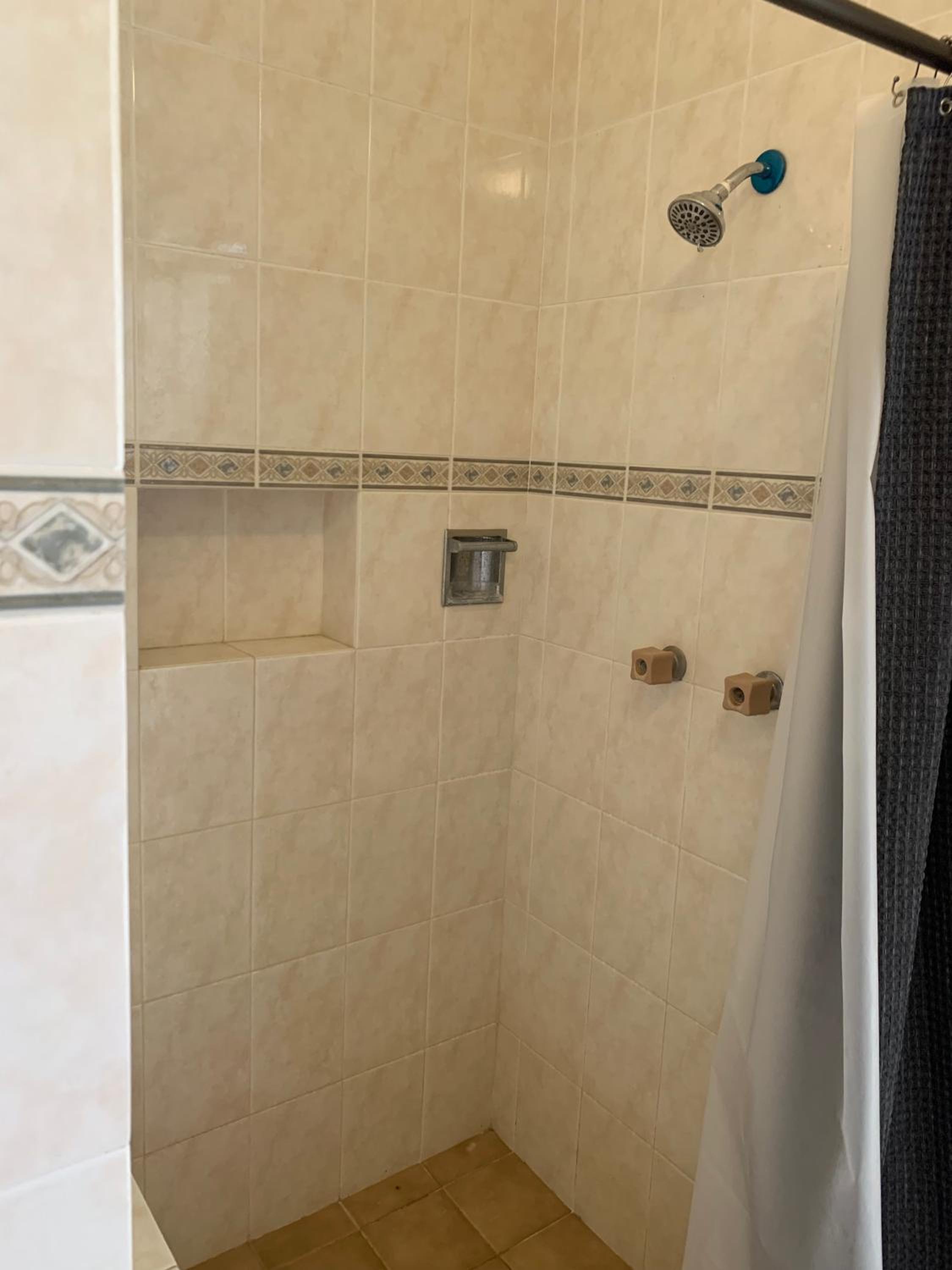Three-Bedroom House - Photo 17