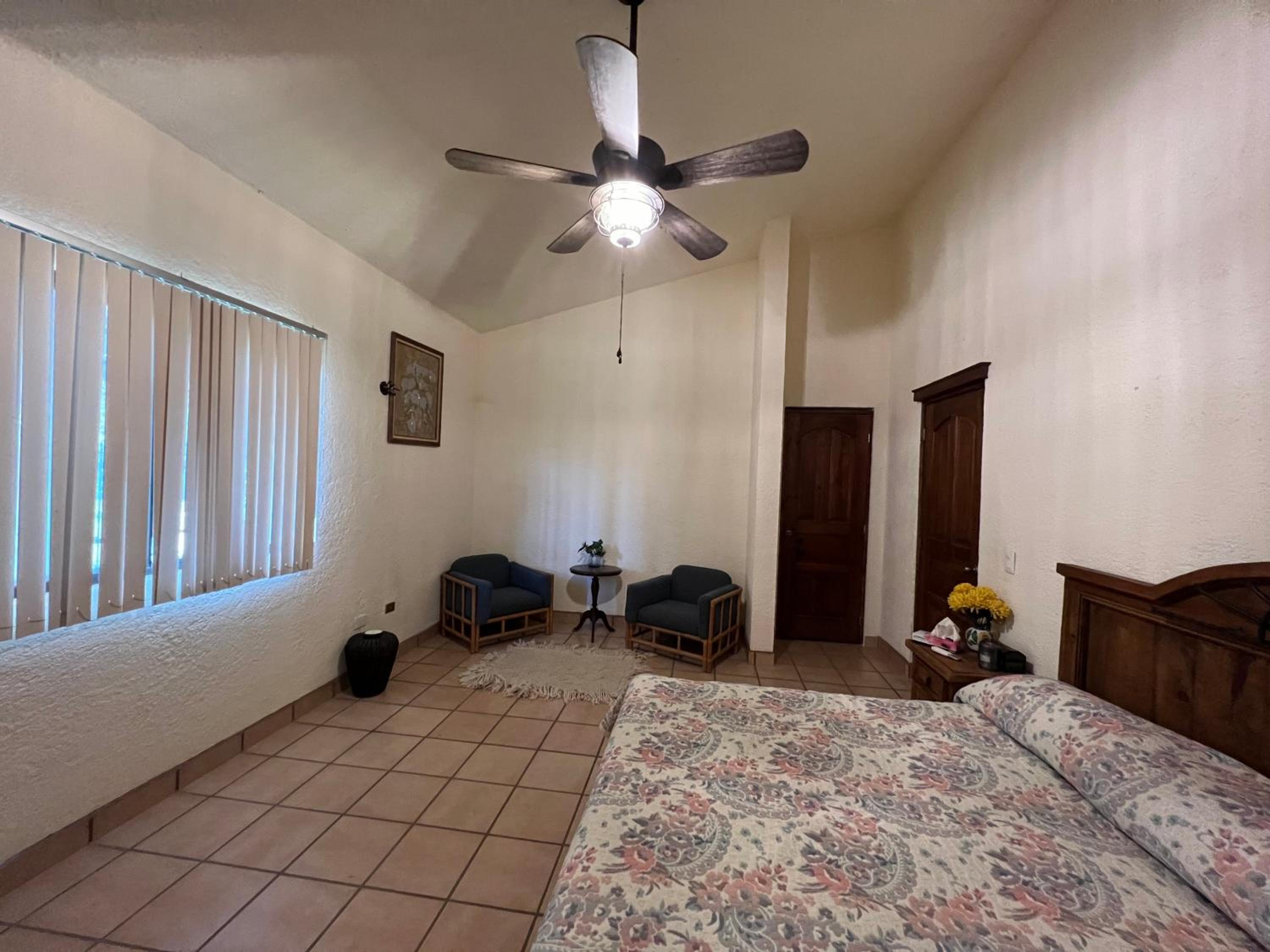 Three-Bedroom House - Photo 24