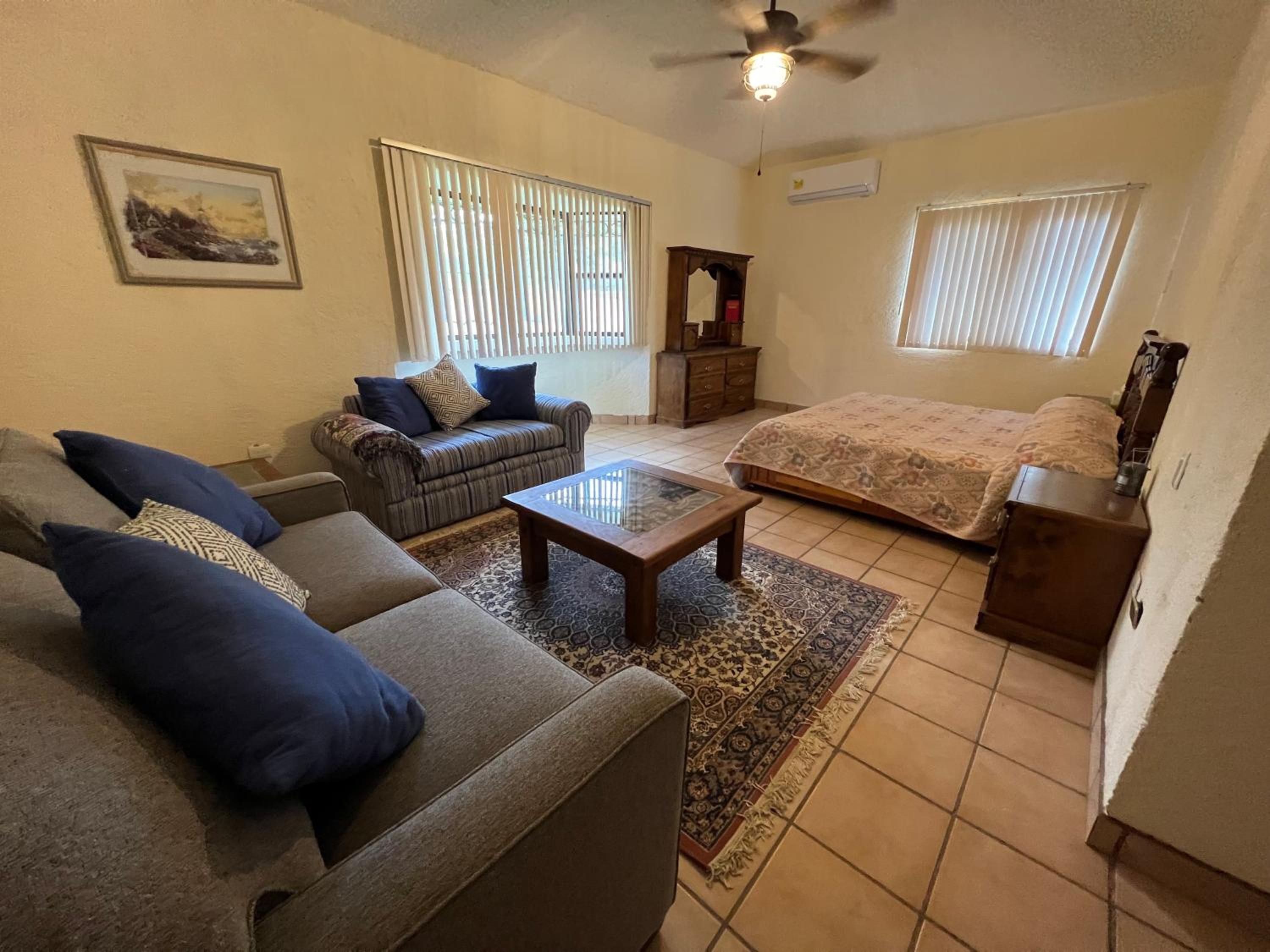 Three-Bedroom House - Photo 23