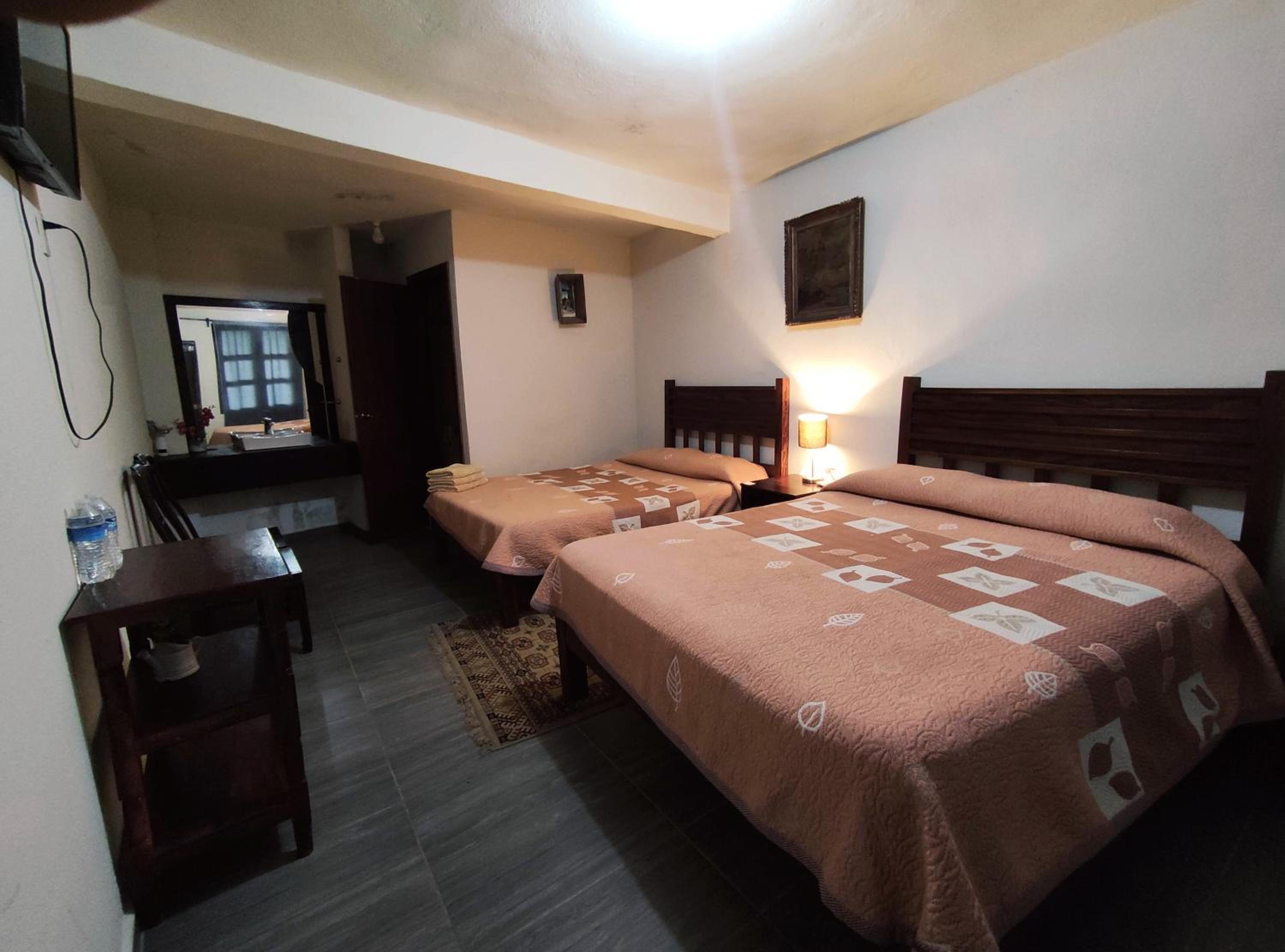 Superior Queen Room with Two Queen Beds - Photo 2