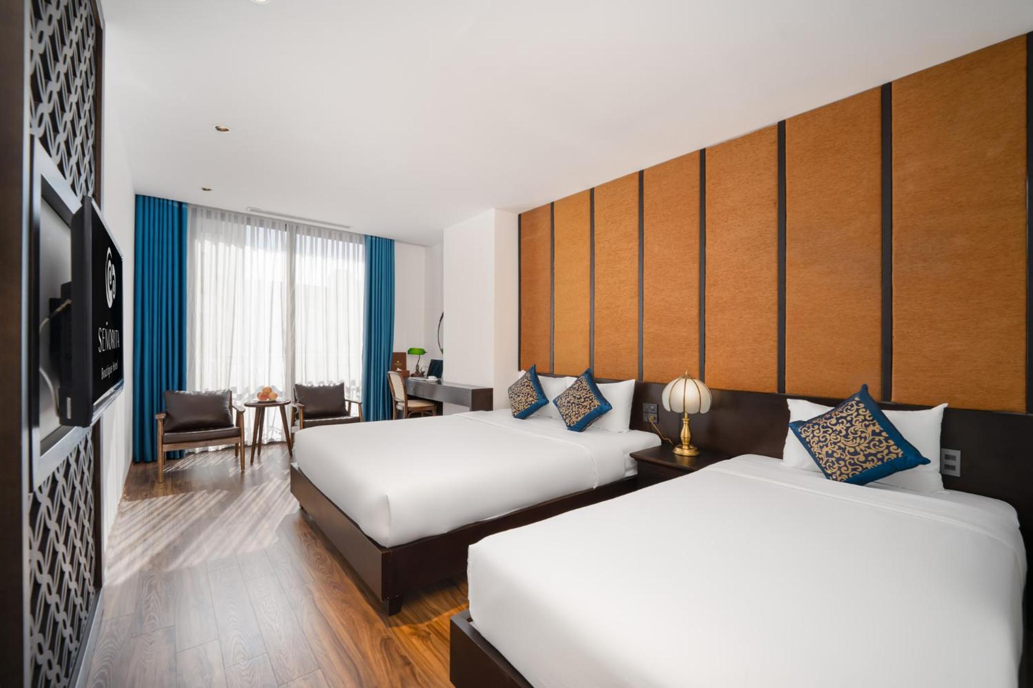 Deluxe Triple Room with Balcony - Photo 1