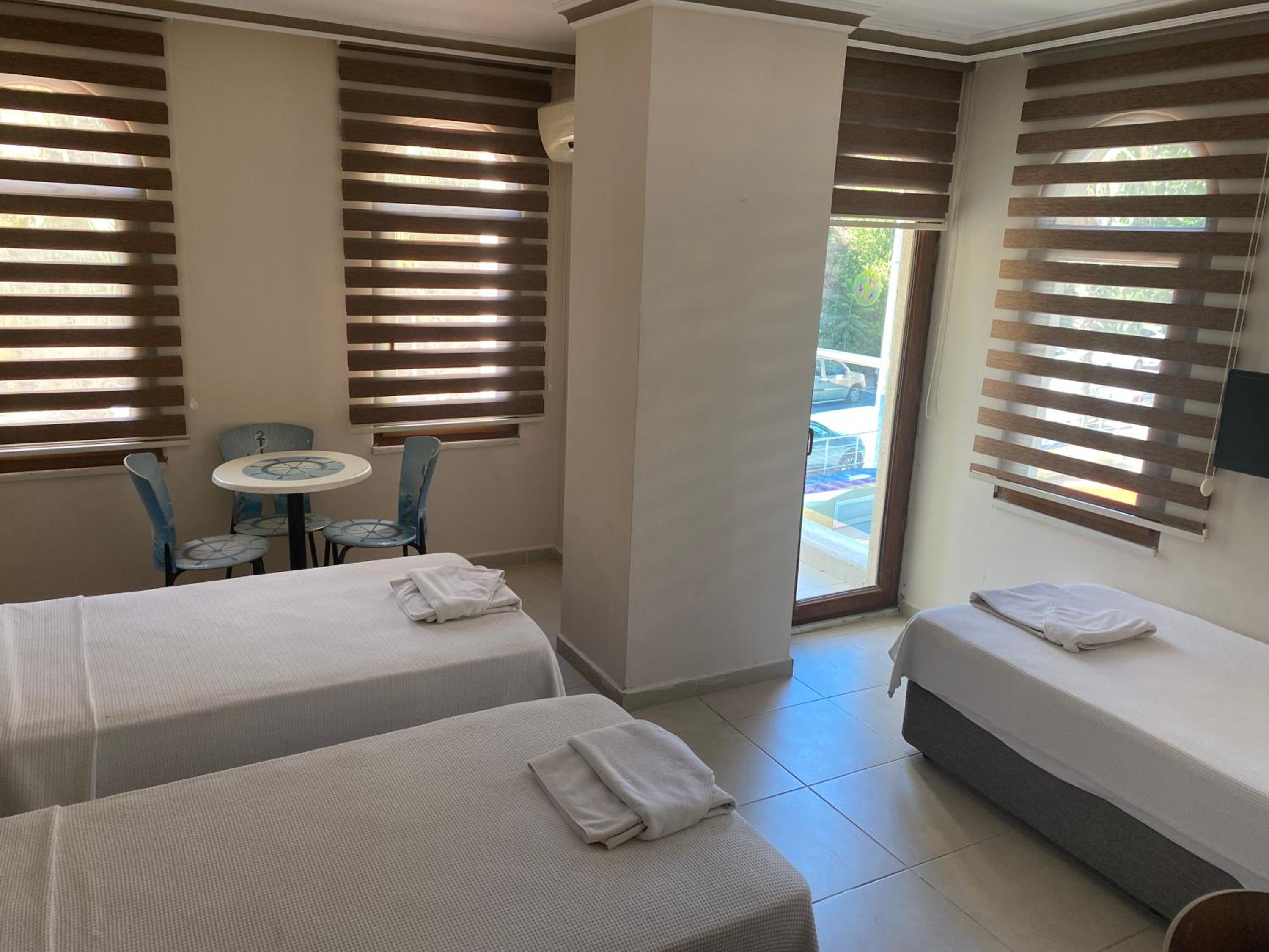 Deluxe Triple Room - Photo 1