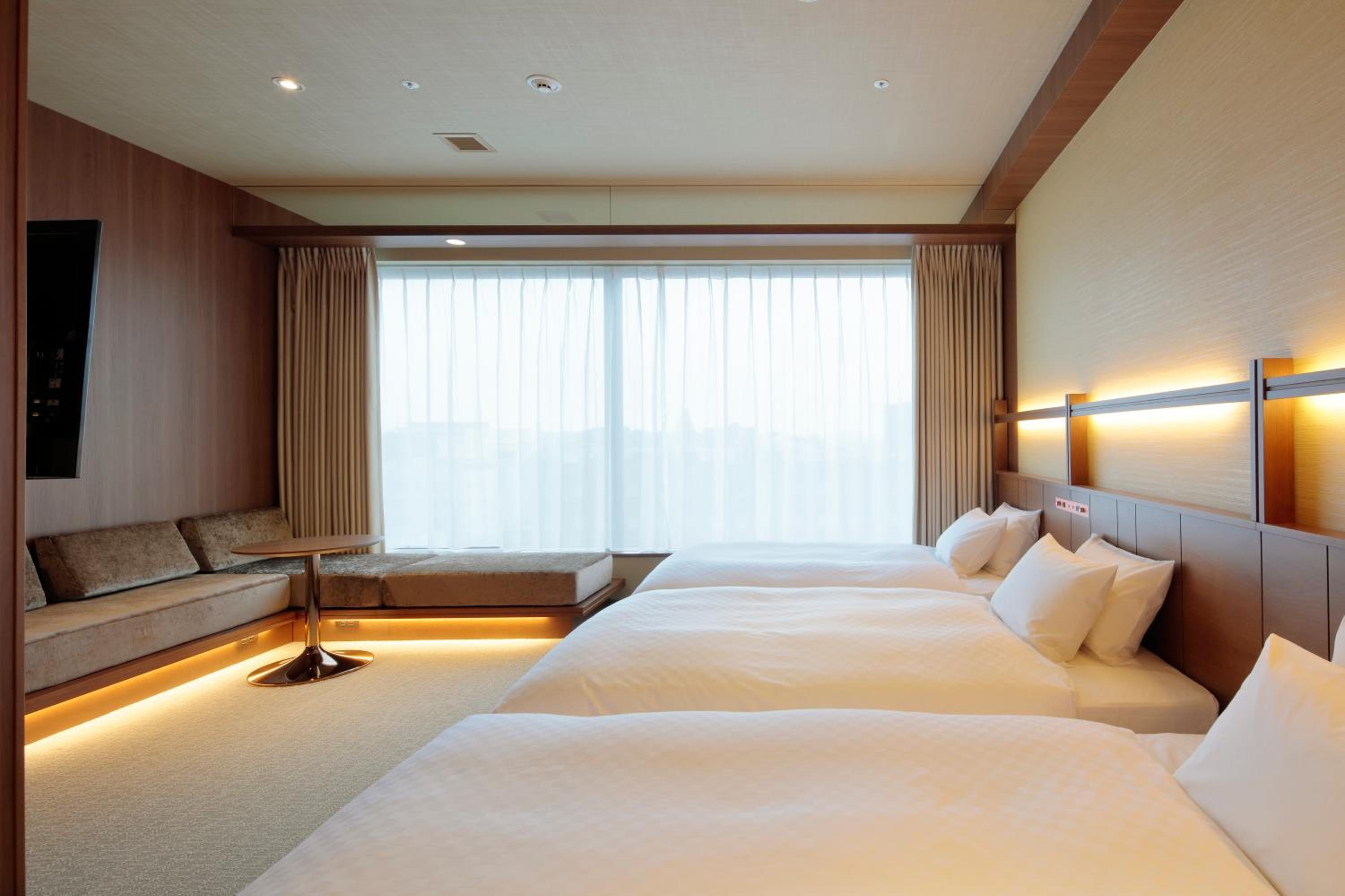 Deluxe Triple Room - Photo 1