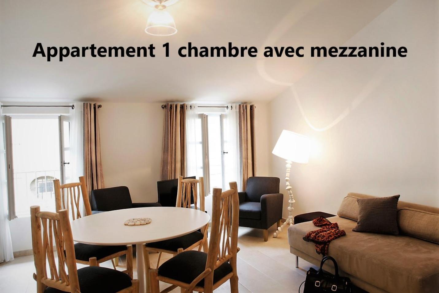 One-Bedroom Apartment with Mezzanine - Photo 2