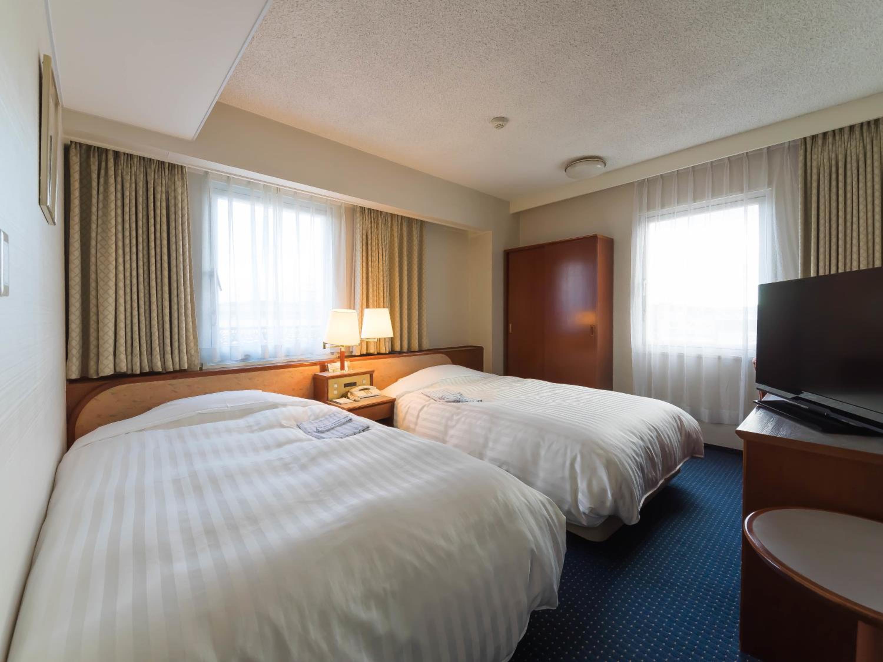 Standard Twin Room - Smoking photo 2