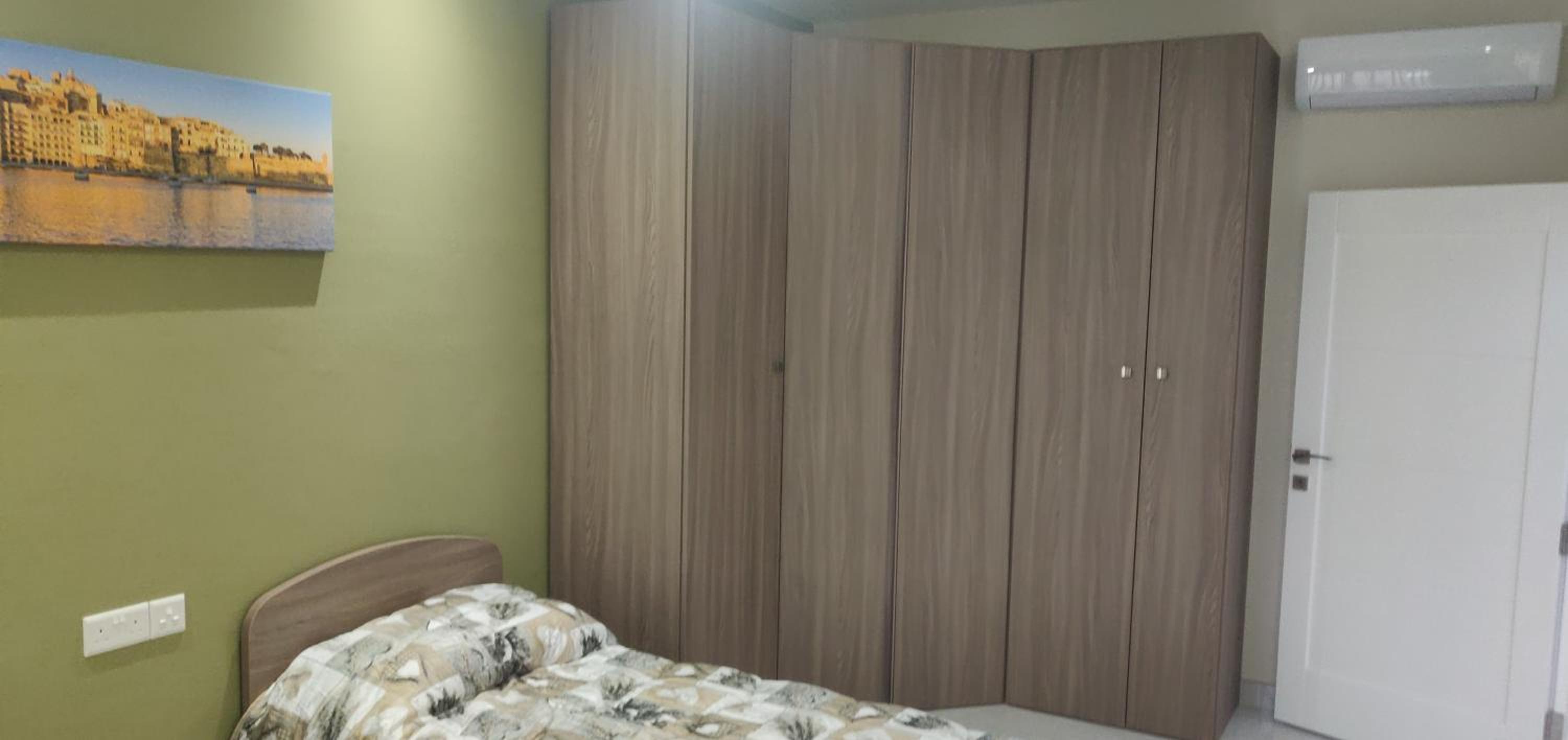 Three-Bedroom Apartment - Photo 3