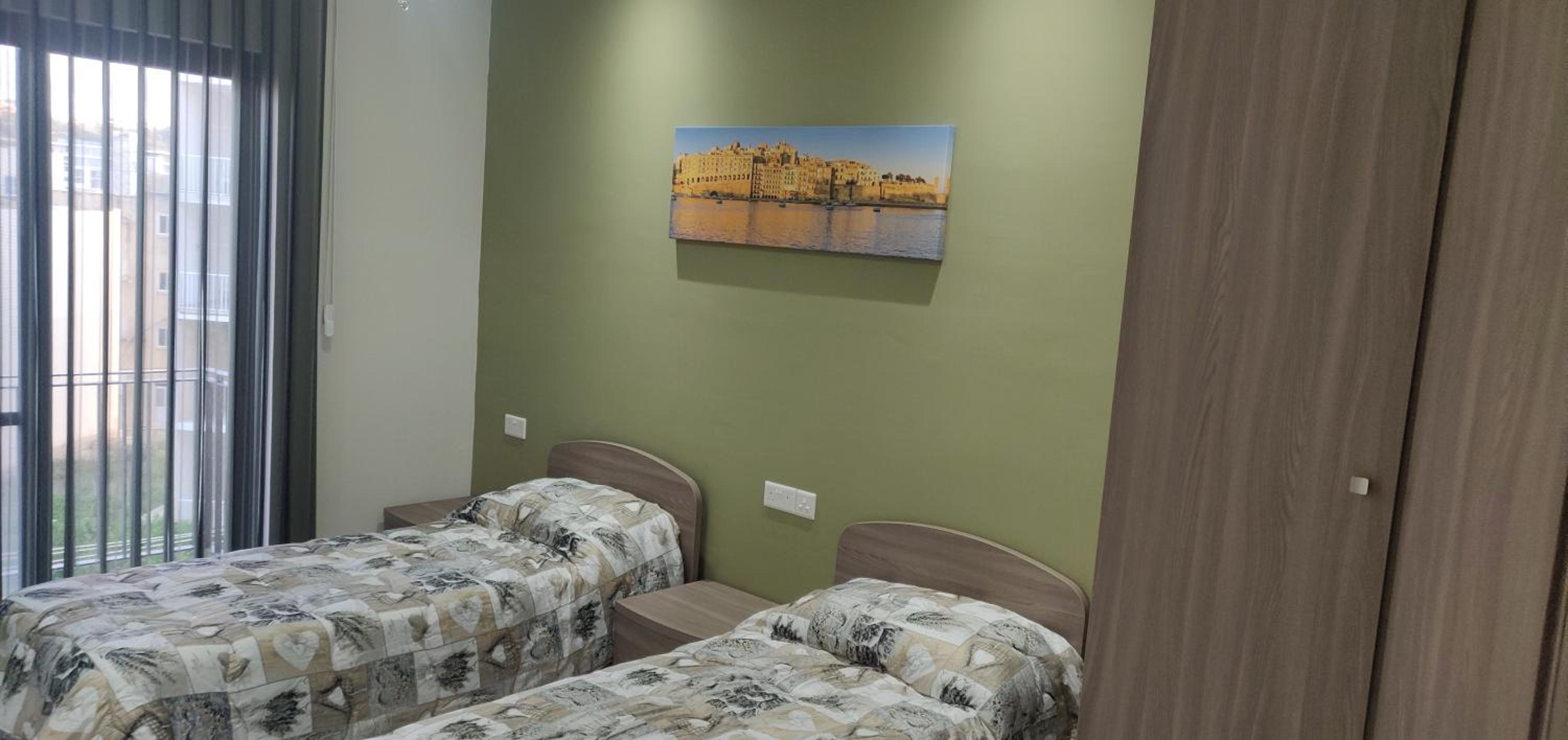 Three-Bedroom Apartment - Photo 9
